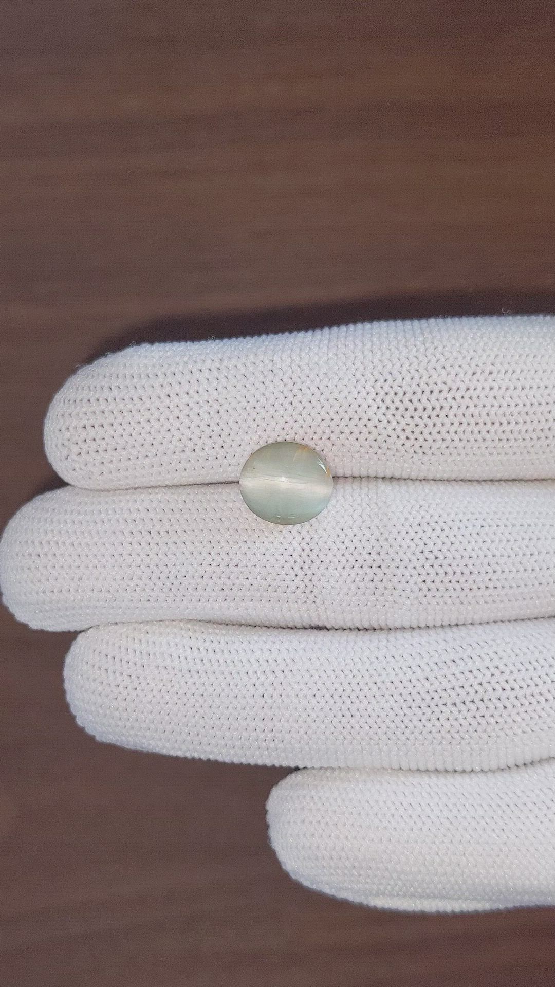 4.60 Ct. Bluish Grey Cabochon Quartz Size Video