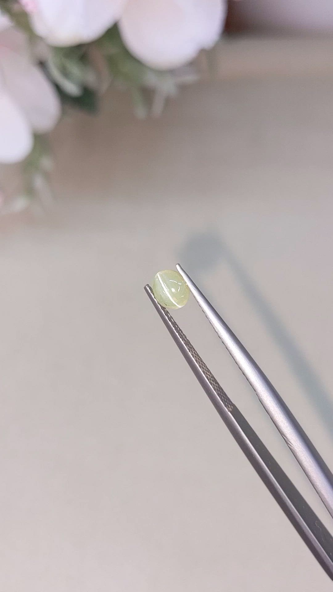 0.50 Ct. Yellowish Green Cabochon Chrysoberyl from Ceylon (Sri Lanka) Size Video