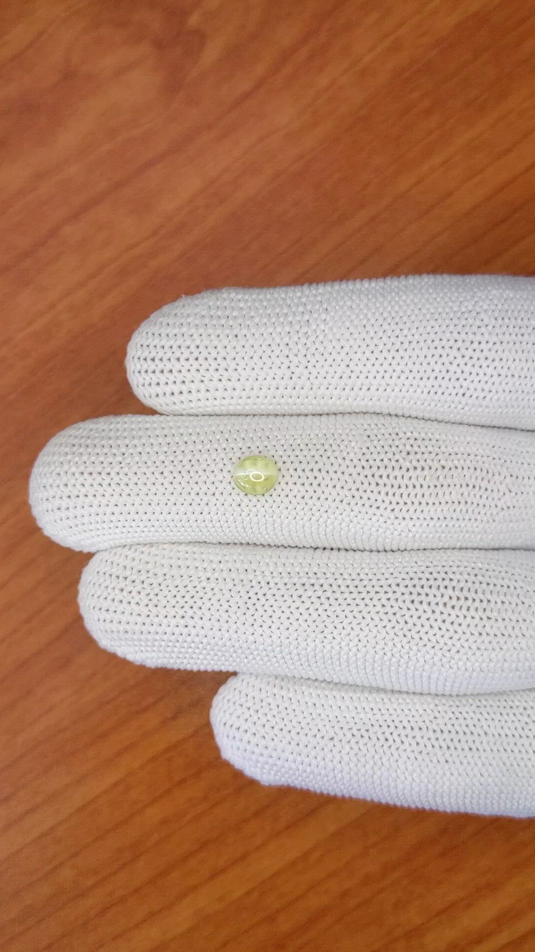 0.50 Ct. Yellowish Green Cabochon Chrysoberyl from Ceylon (Sri Lanka) Size Video