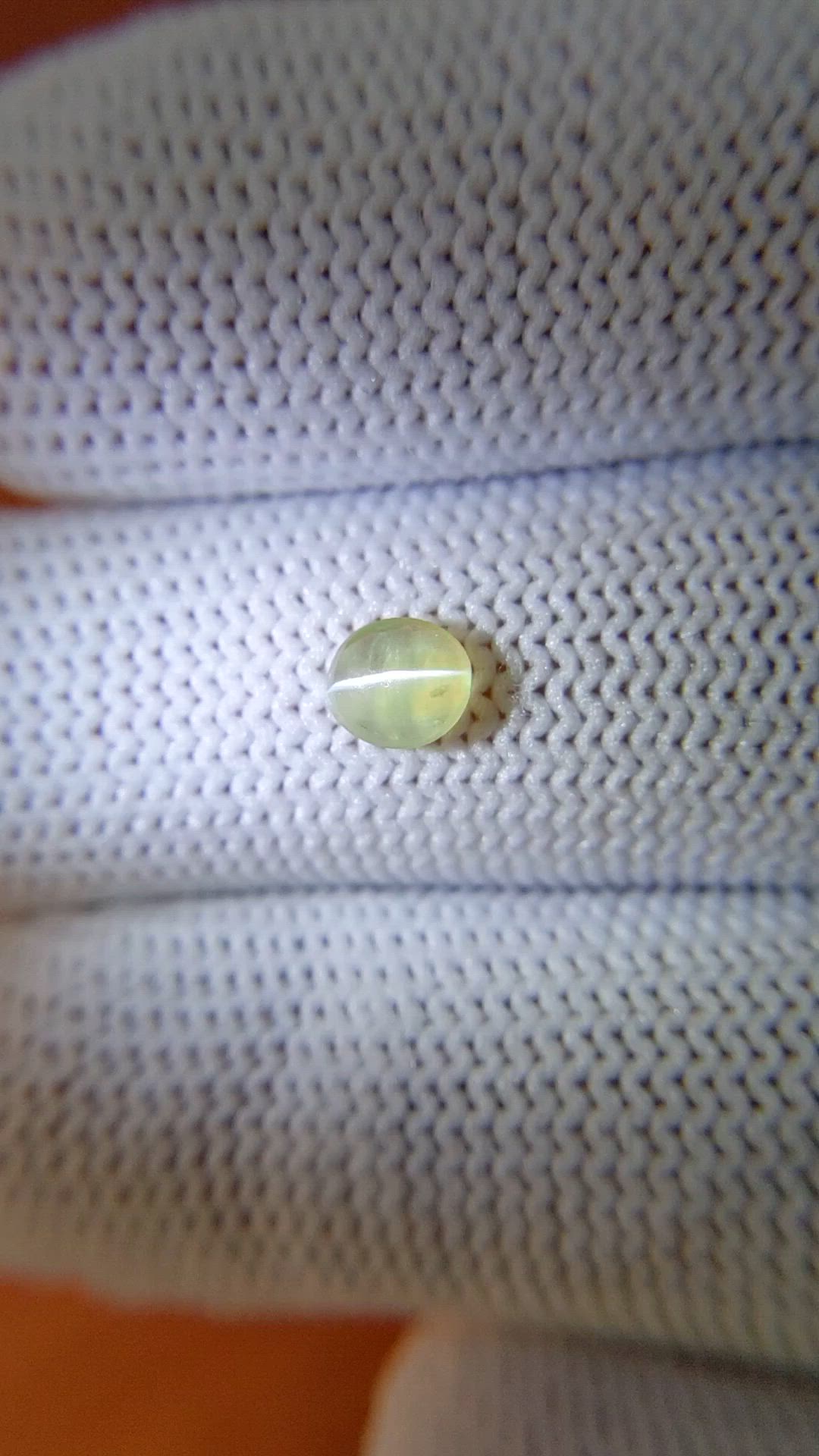0.50 Ct. Yellowish Green Cabochon Chrysoberyl from Ceylon (Sri Lanka) Size Video