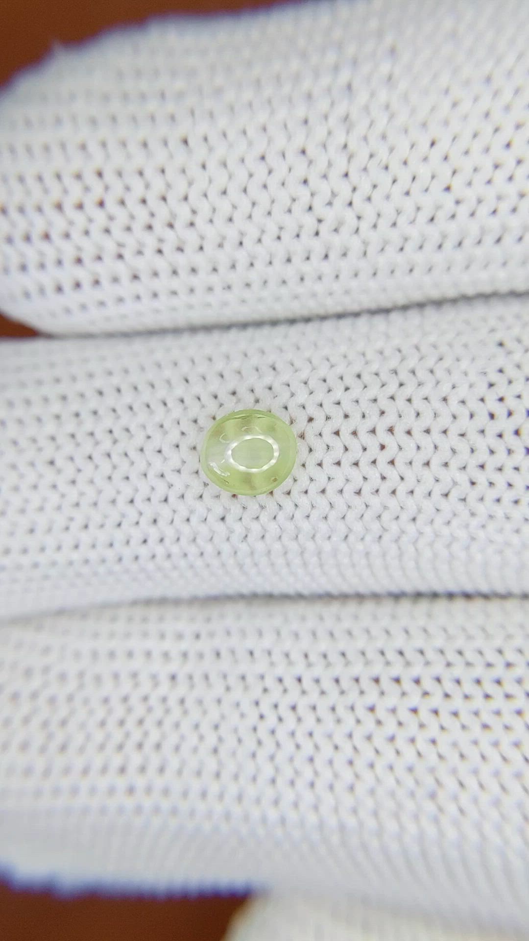 0.50 Ct. Yellowish Green Cabochon Chrysoberyl from Ceylon (Sri Lanka) Size Video