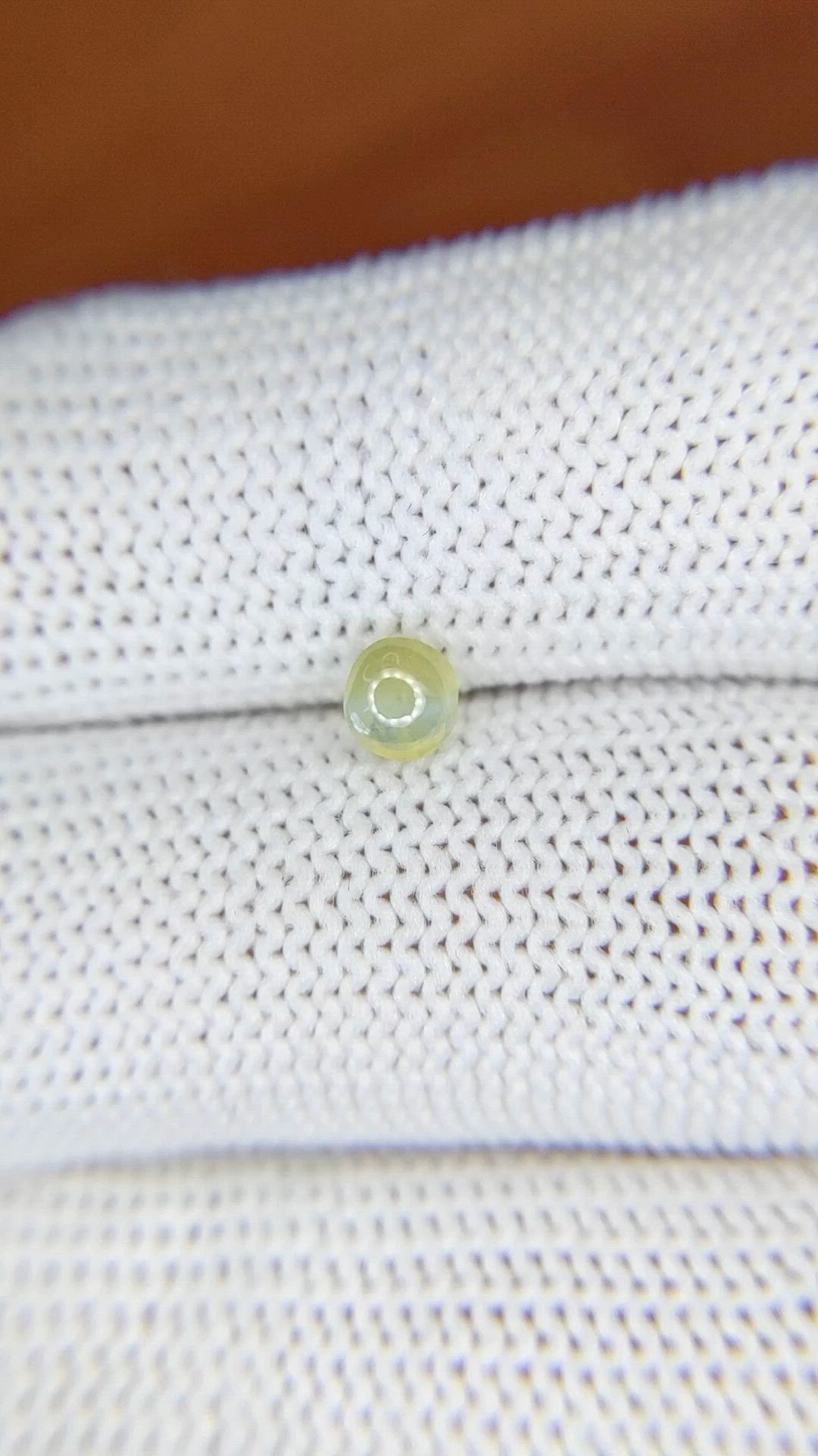 0.57 Ct. Greenish Yellow Cabochon Chrysoberyl from Ceylon (Sri Lanka) Size Video