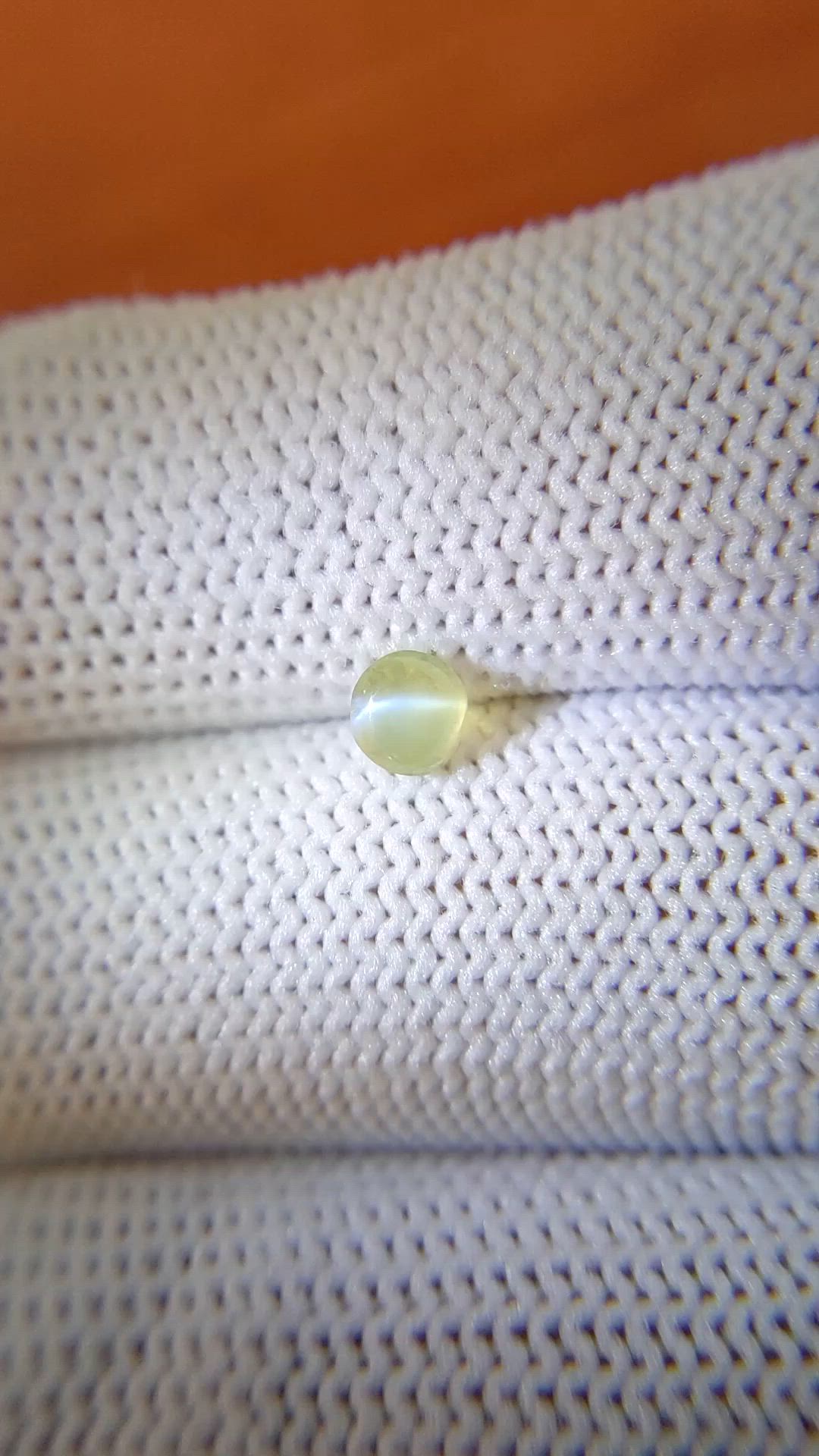 0.57 Ct. Greenish Yellow Cabochon Chrysoberyl from Ceylon (Sri Lanka) Size Video