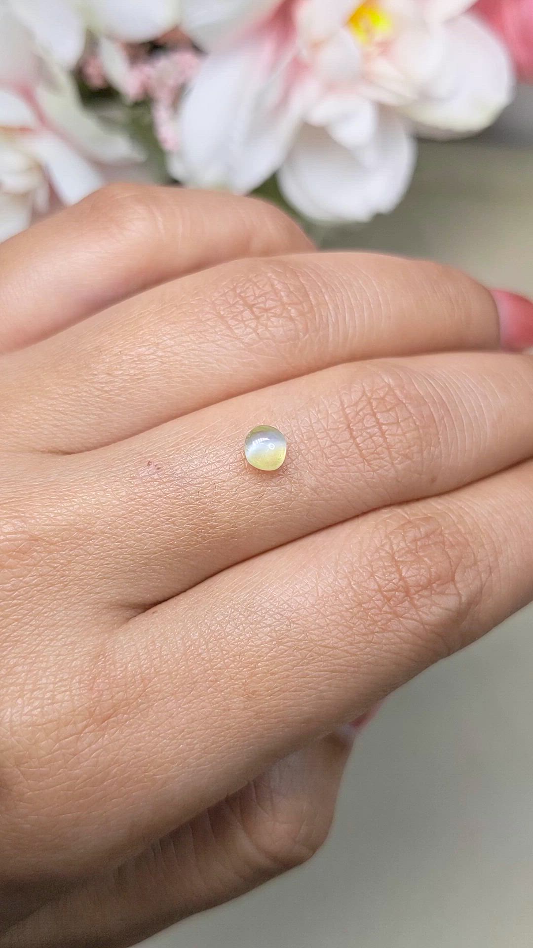 0.57 Ct. Greenish Yellow Cabochon Chrysoberyl from Ceylon (Sri Lanka) Size Video