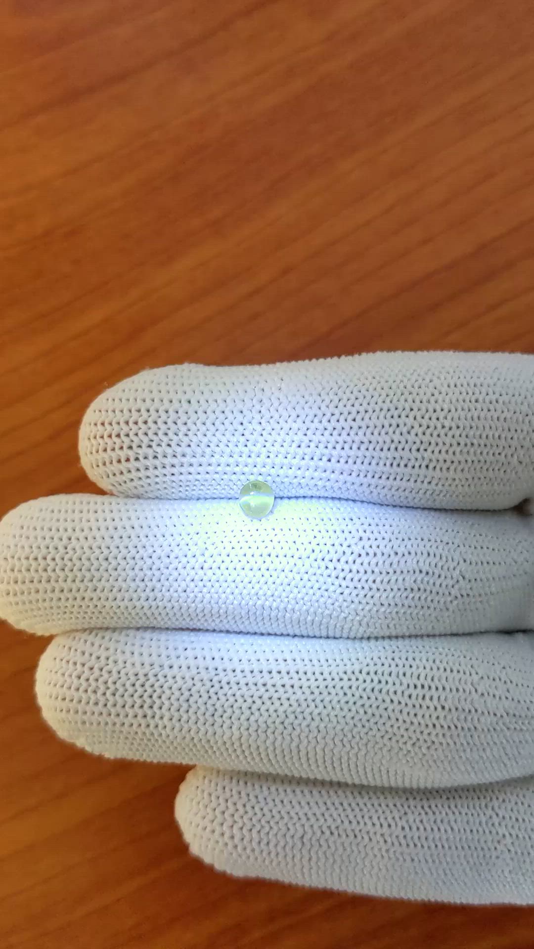 0.57 Ct. Greenish Yellow Cabochon Chrysoberyl from Ceylon (Sri Lanka) Size Video