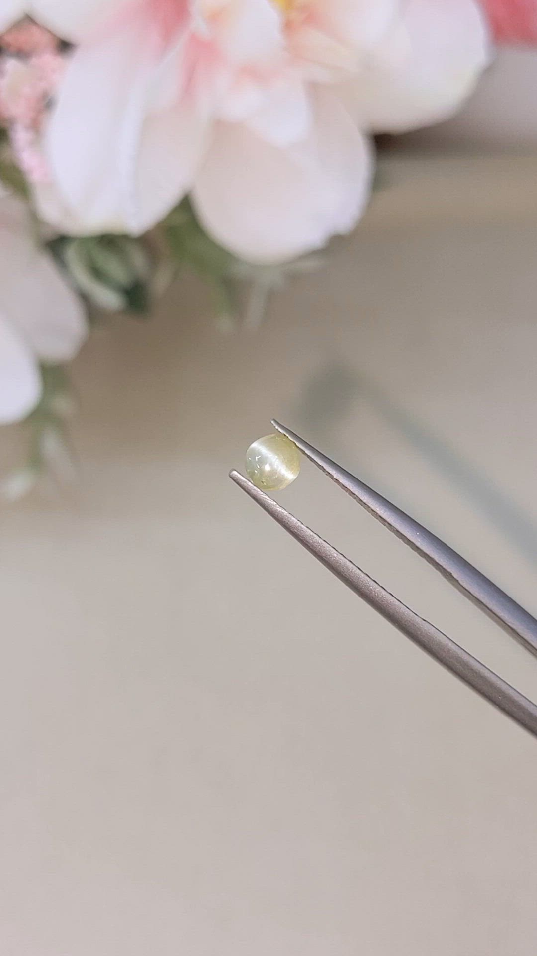 0.57 Ct. Greenish Yellow Cabochon Chrysoberyl from Ceylon (Sri Lanka) Size Video