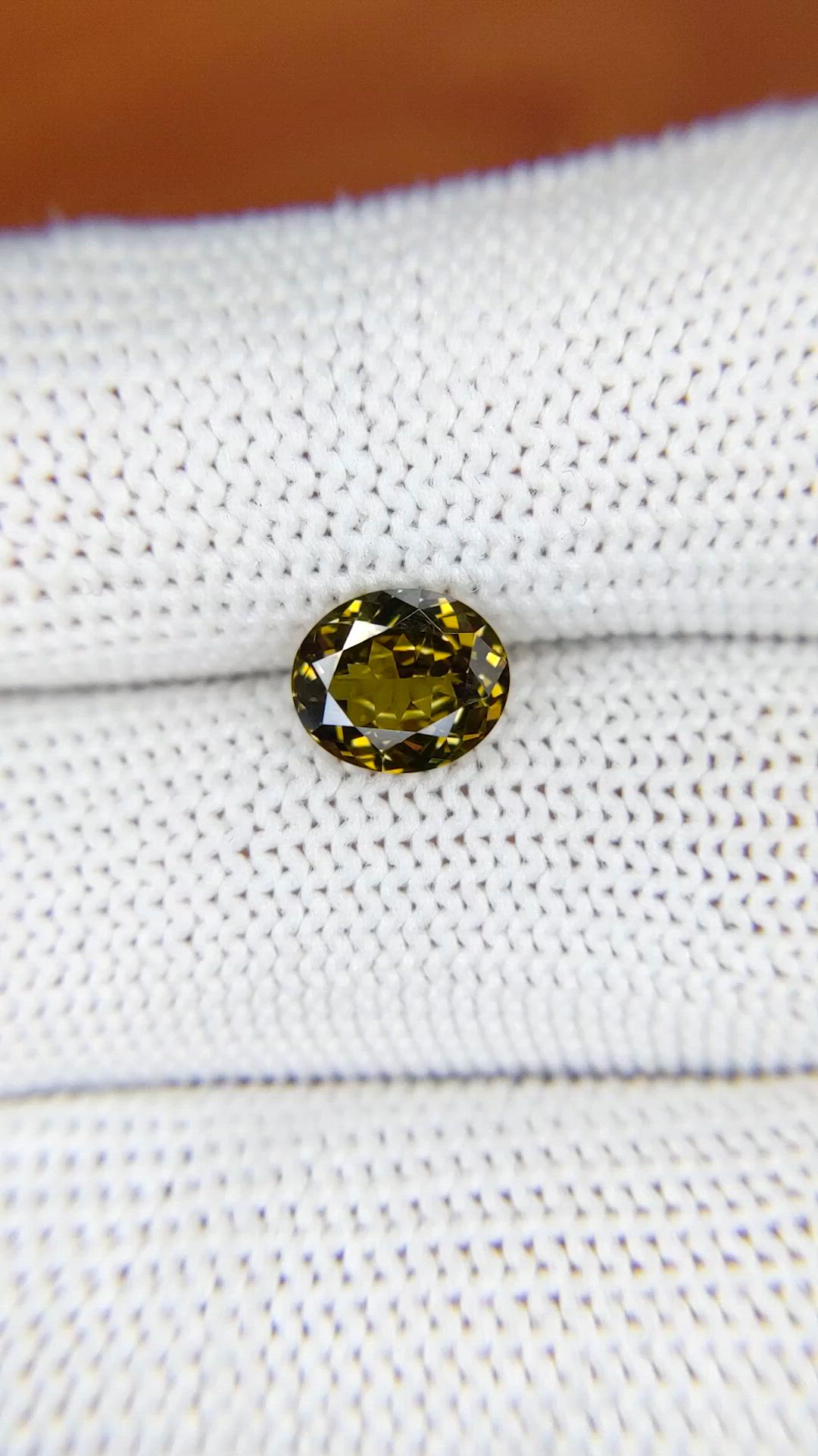 1.62 Ct. Greenish Brown Demantoid Garnet from Madagascar Size Video