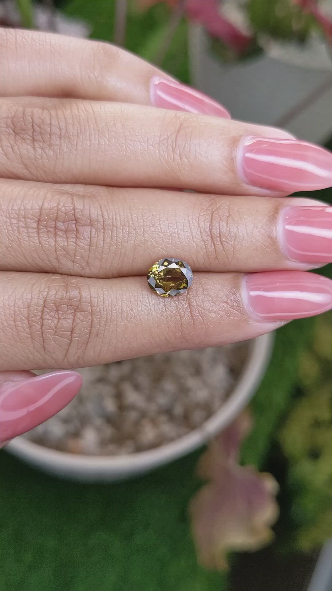 1.62 Ct. Greenish Brown Demantoid Garnet from Madagascar Size Video