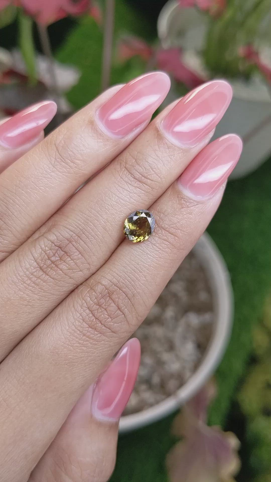 1.62 Ct. Greenish Brown Demantoid Garnet from Madagascar Size Video