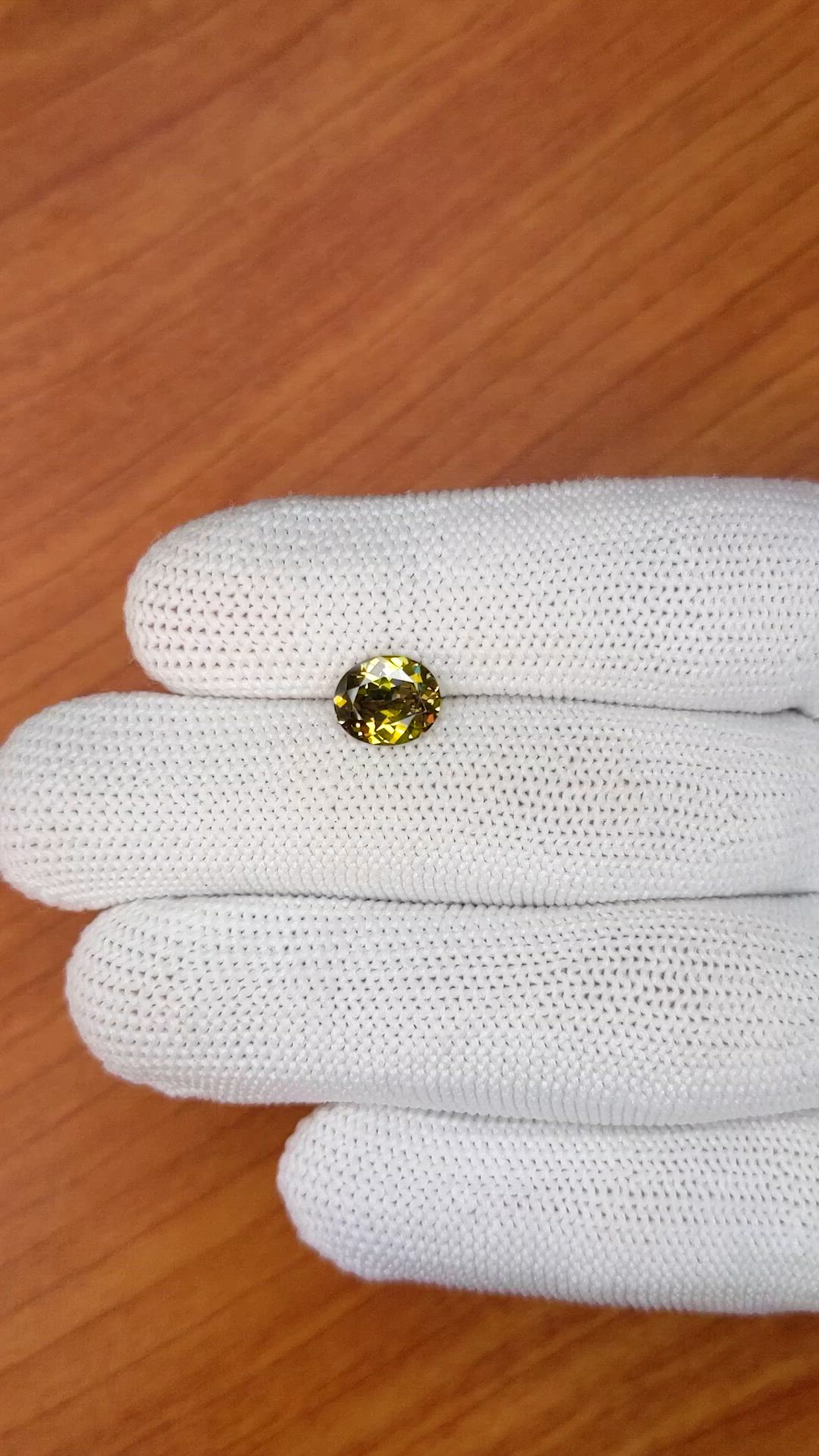 1.62 Ct. Brownish Green Demantoid Garnet from Madagascar Size Video