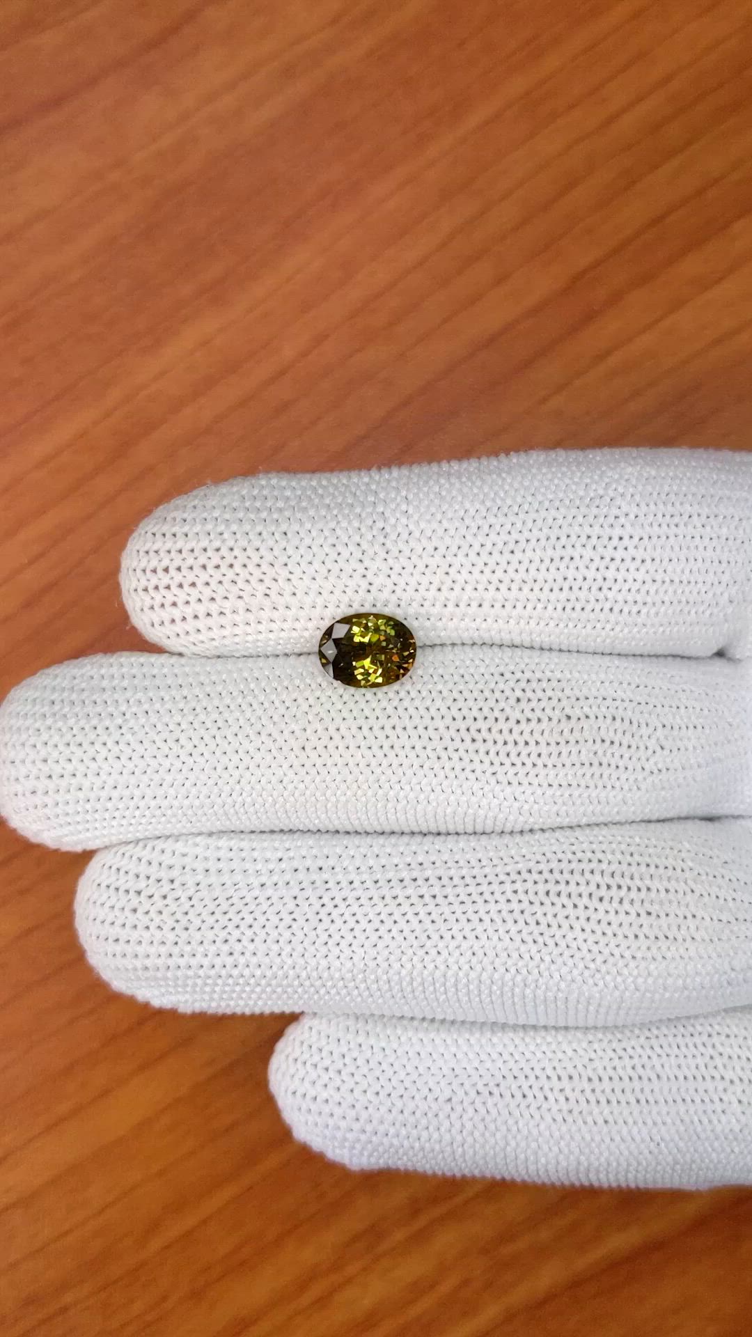 1.97 Ct. Greenish Brown Demantoid Garnet from Madagascar Size Video