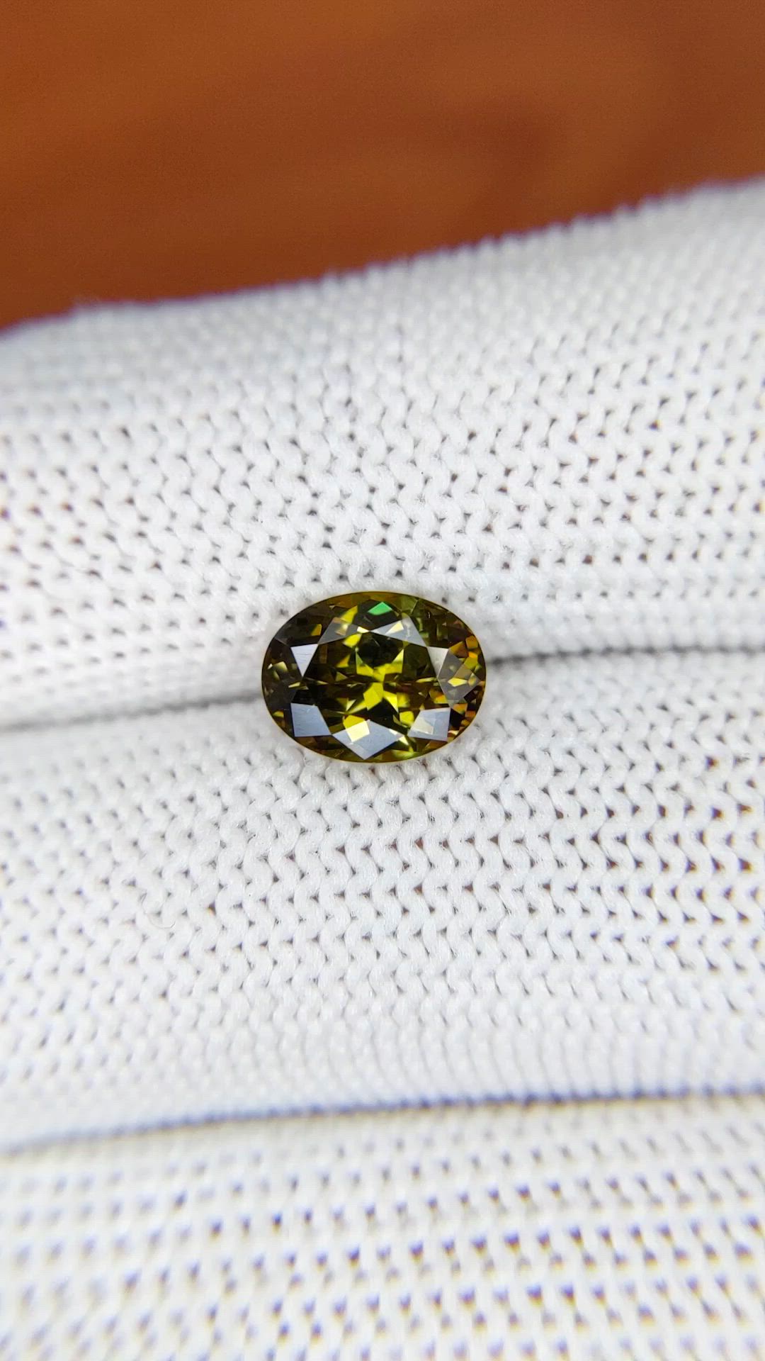 1.97 Ct. Greenish Brown Demantoid Garnet from Madagascar Size Video