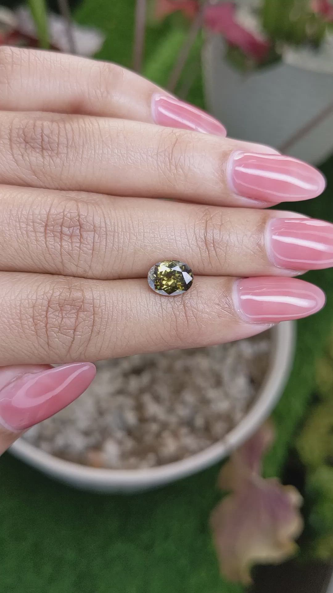 1.97 Ct. Greenish Brown Demantoid Garnet from Madagascar Size Video