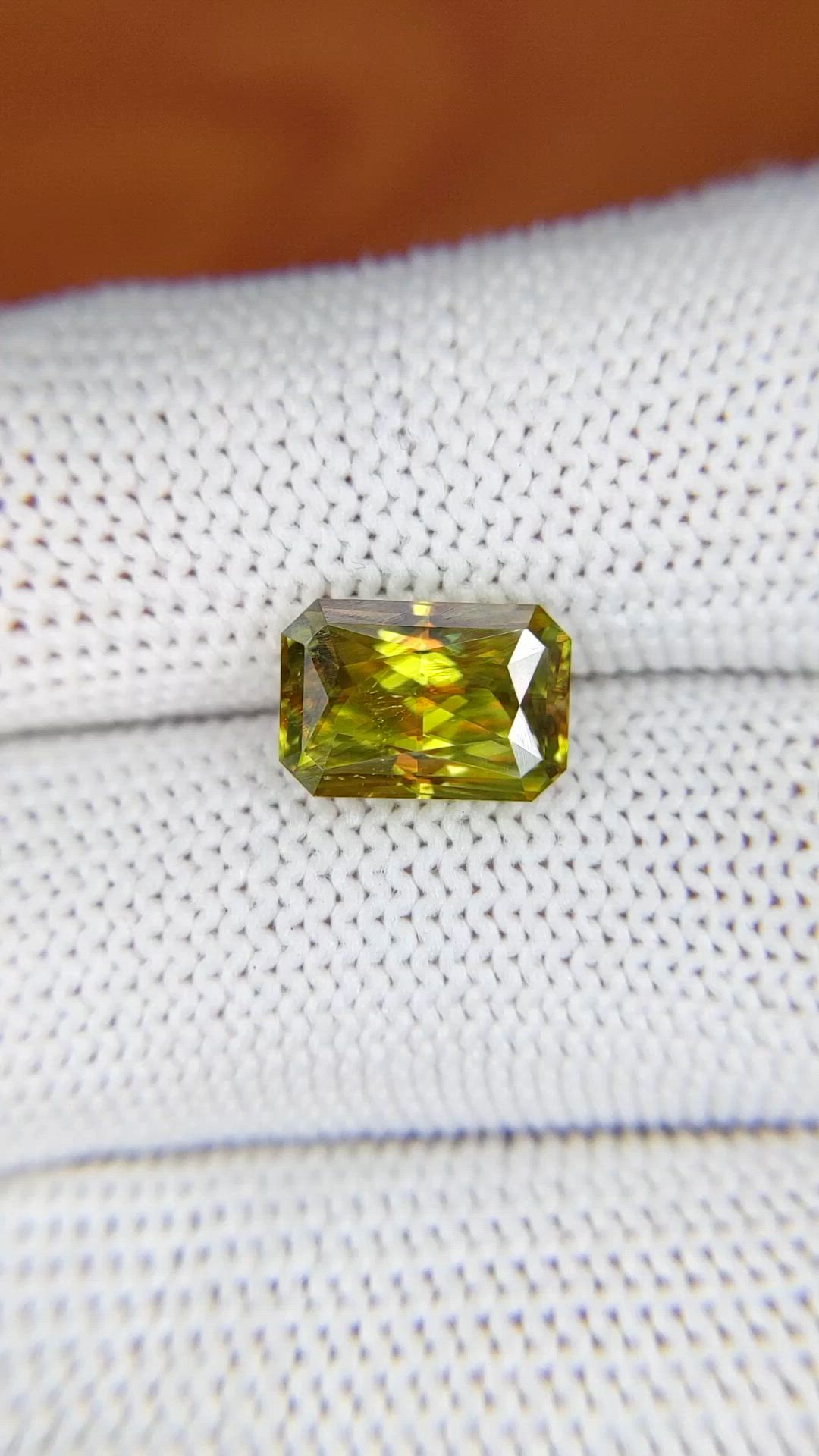 3.23 Ct. Greenish Brown Sphene (Titanite) from Madagascar Size Video