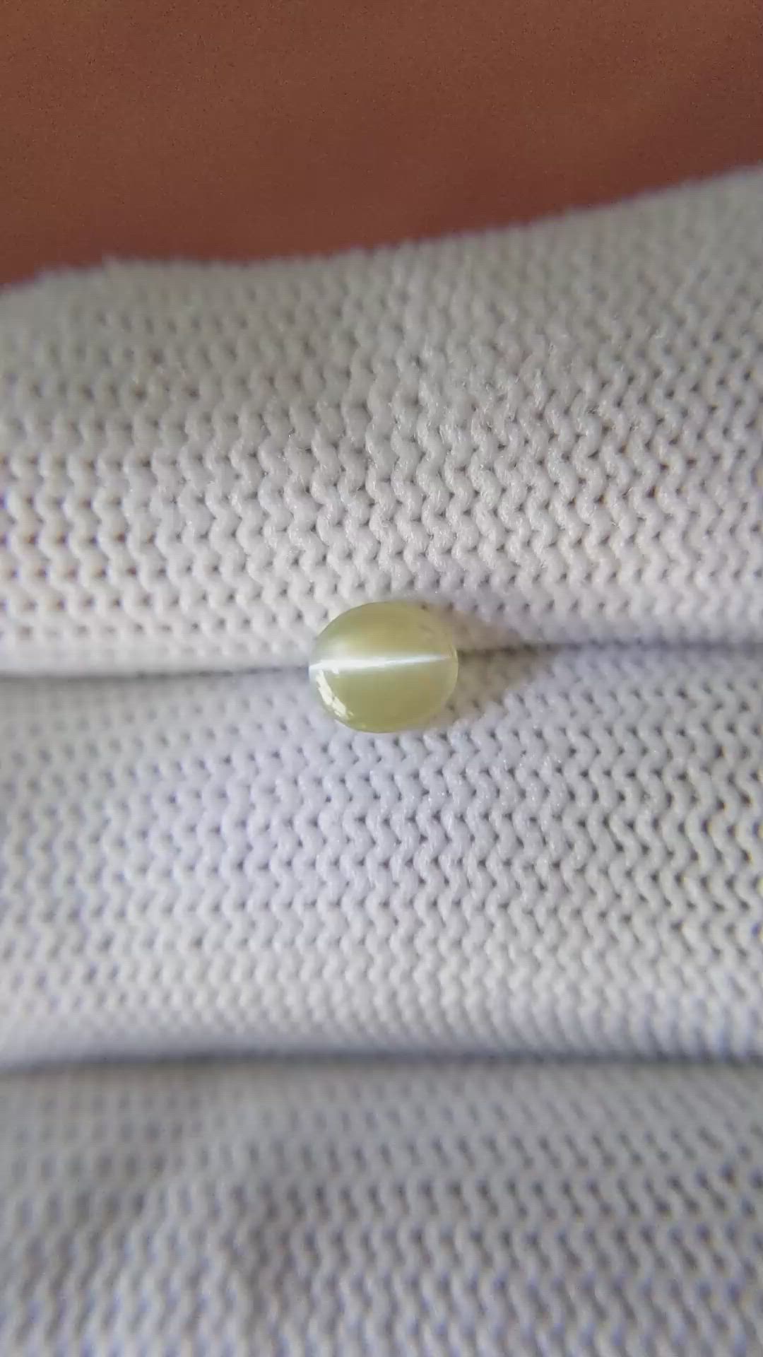 0.83 Ct. Brownish Yellow Cabochon Chrysoberyl from Ceylon (Sri Lanka) Size Video