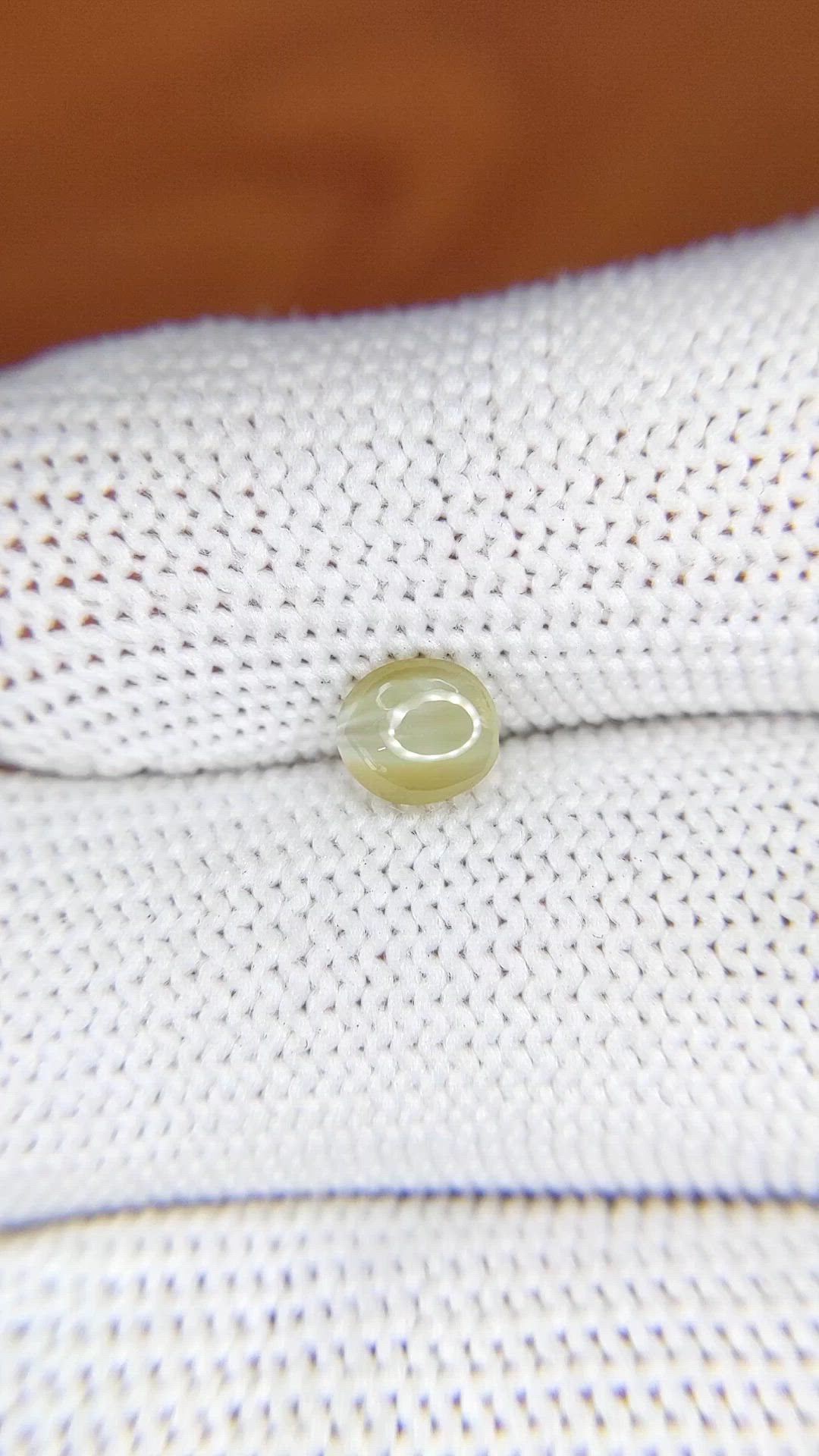 0.83 Ct. Brownish Yellow Cabochon Chrysoberyl from Ceylon (Sri Lanka) Size Video