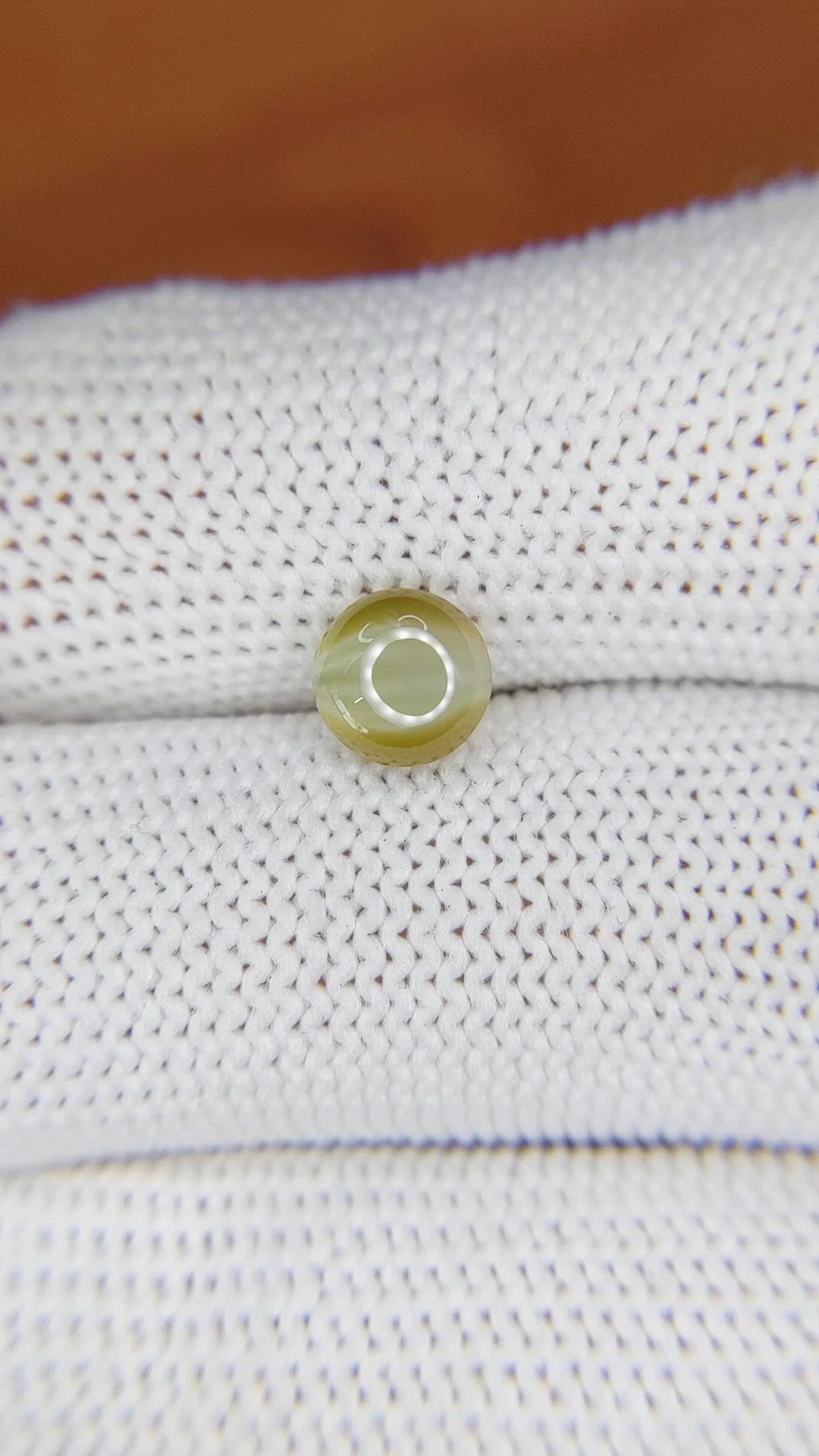 1.68 Ct. Brownish Yellow Cabochon Chrysoberyl from Ceylon (Sri Lanka) Size Video