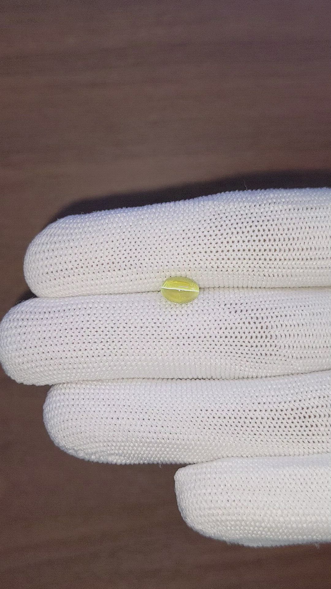 1.63 Ct. Greenish Yellow Cabochon Chrysoberyl from Madagascar Size Video