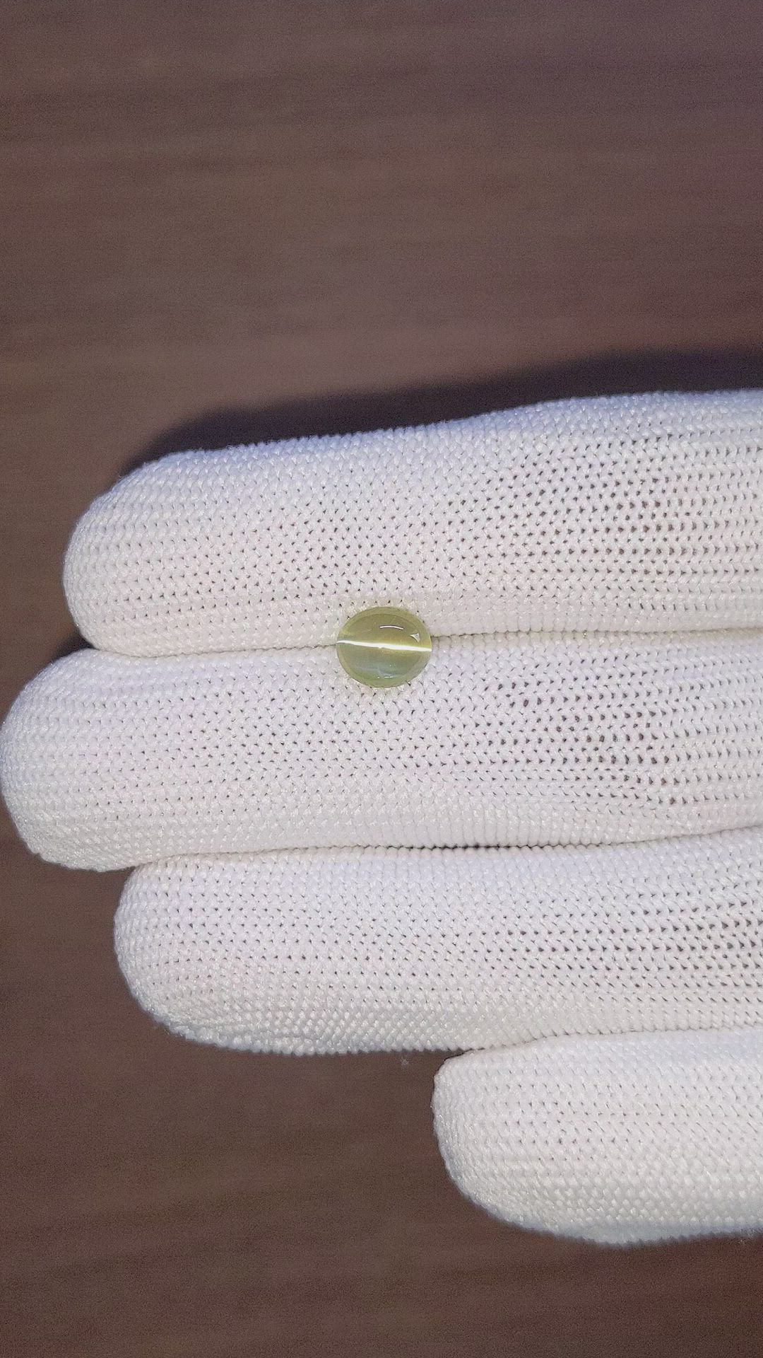 2.02 Ct. Yellowish Green Cabochon Chrysoberyl from Tanzania Size Video