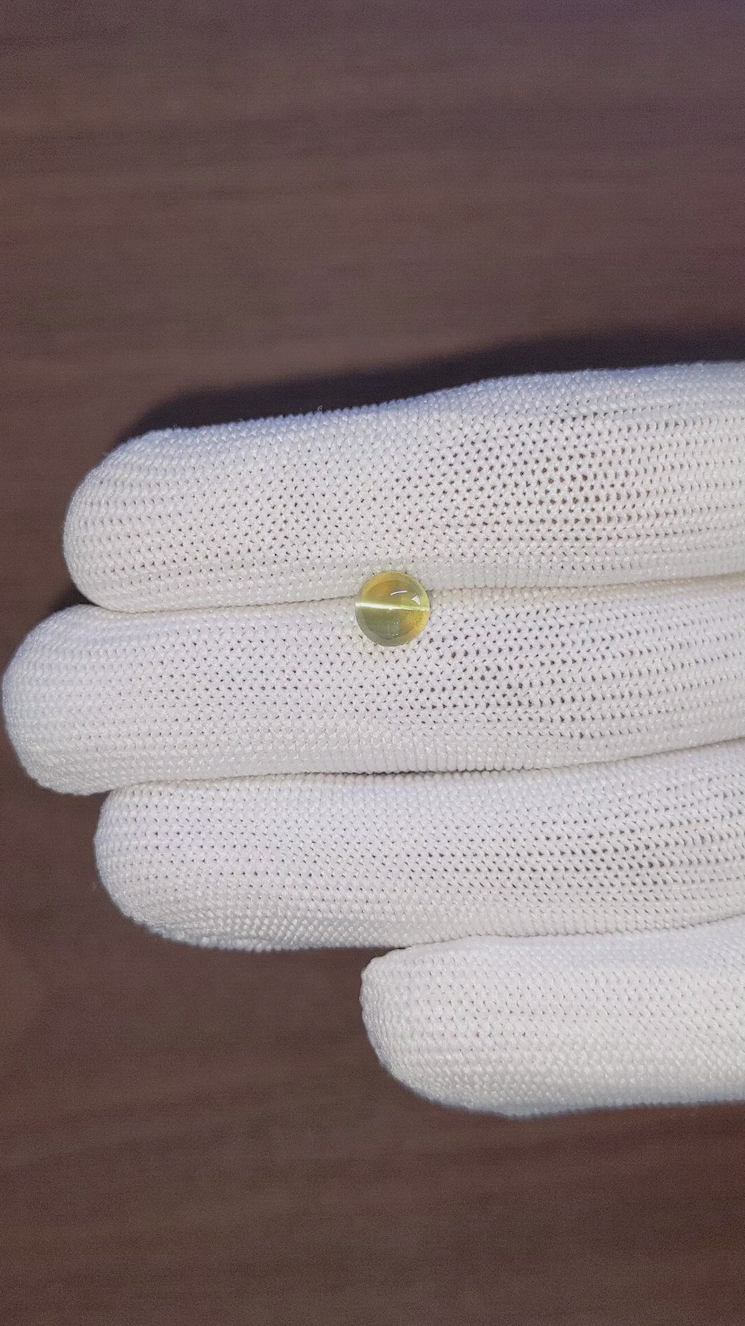 2.08 Ct. Yellowish Green Cabochon Chrysoberyl from Tanzania Size Video