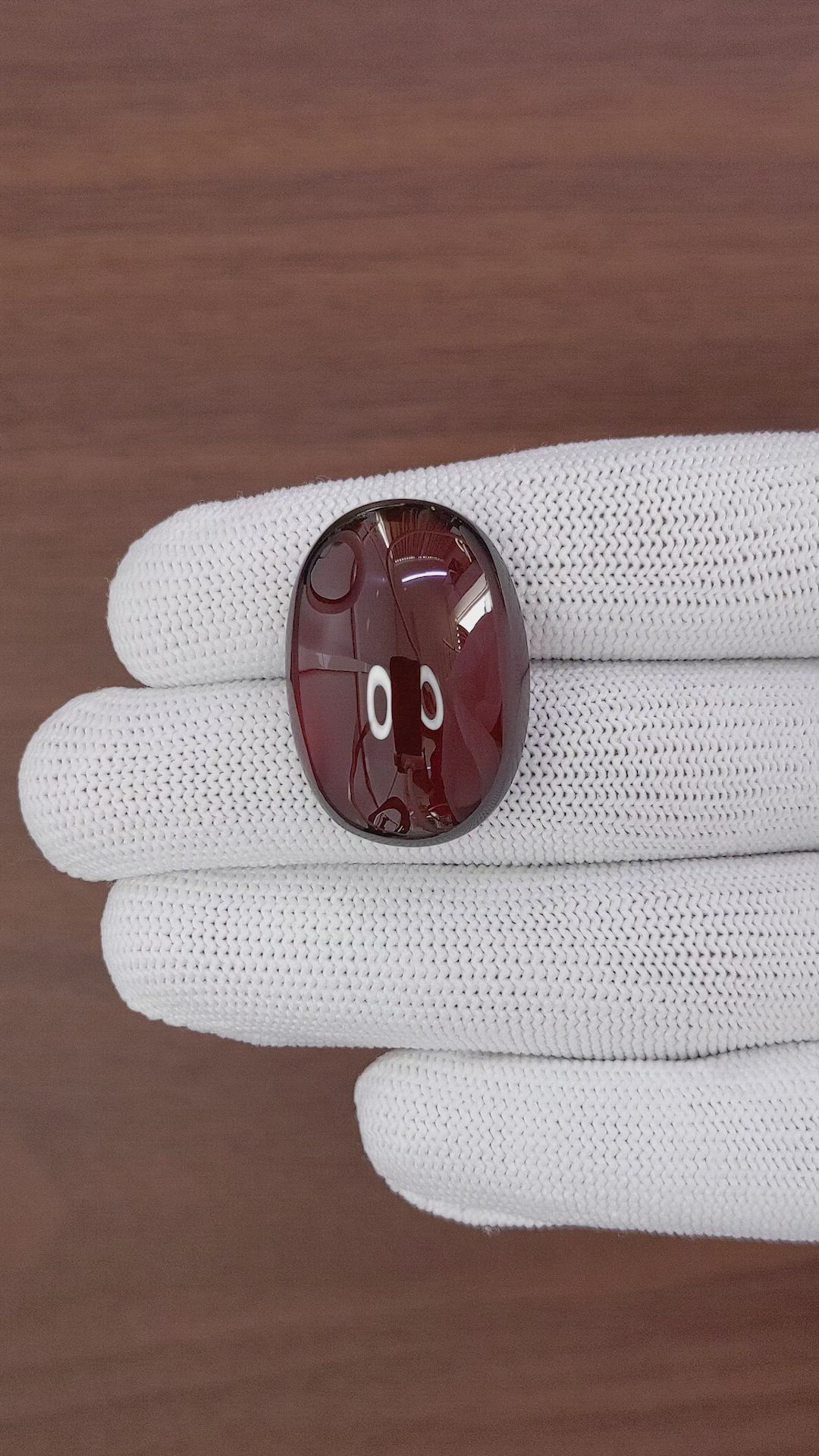 56.31 Ct. Red Cabochon Hessonite Garnet Size Video