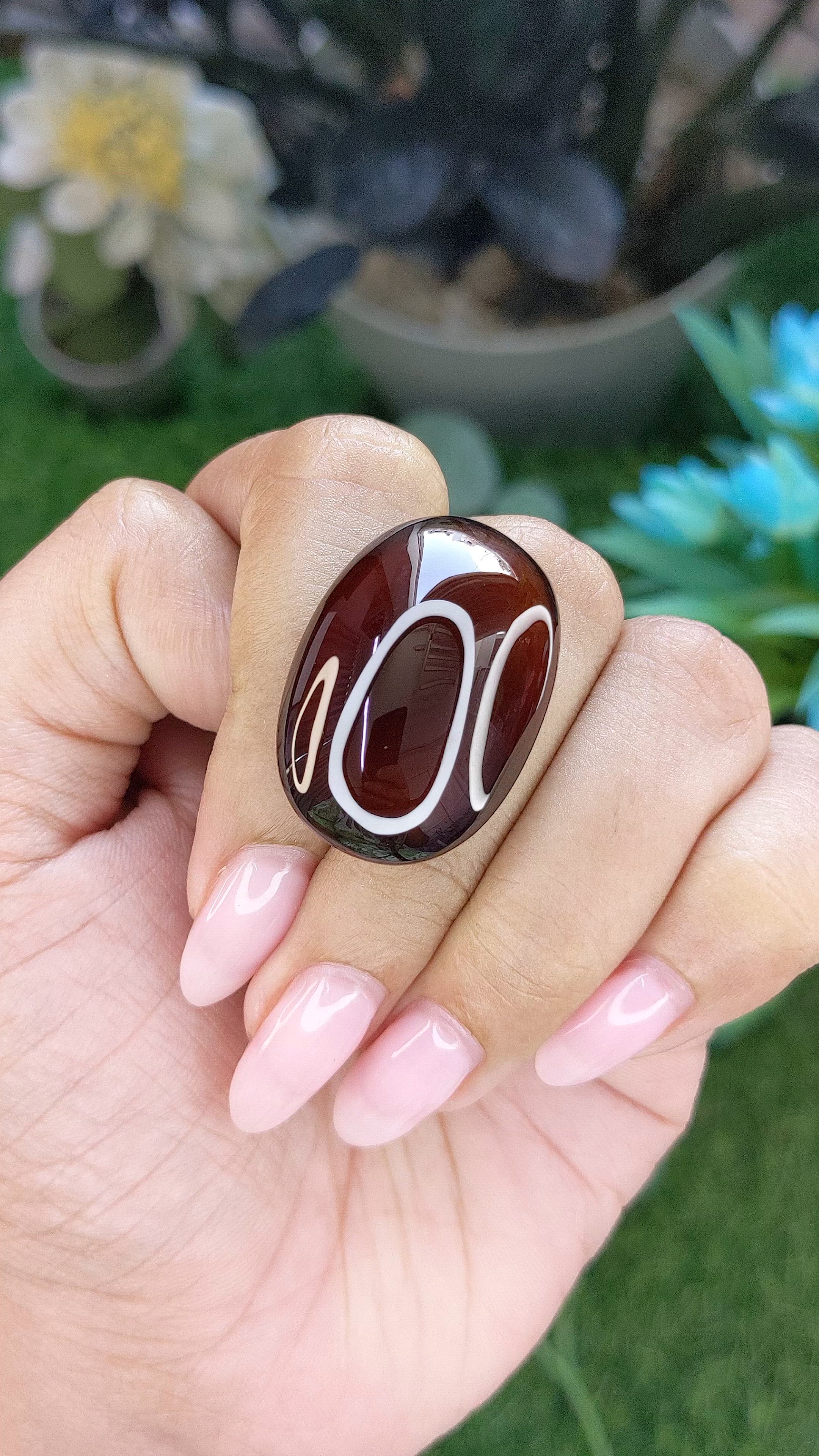 56.31 Ct. Red Cabochon Hessonite Garnet Size Video