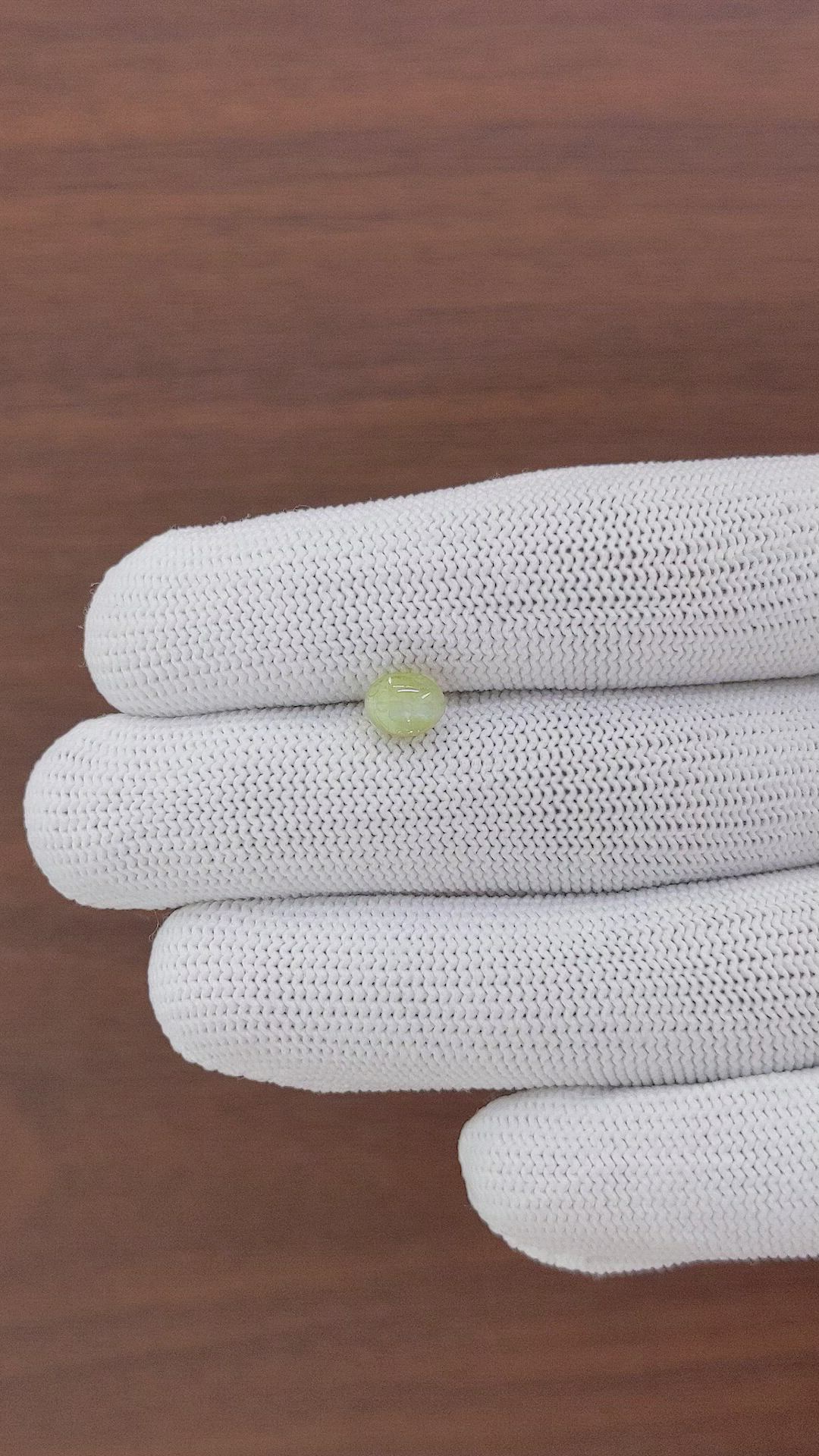 1.71 Ct. Greenish Yellow Cabochon Chrysoberyl from Ceylon (Sri Lanka) Size Video