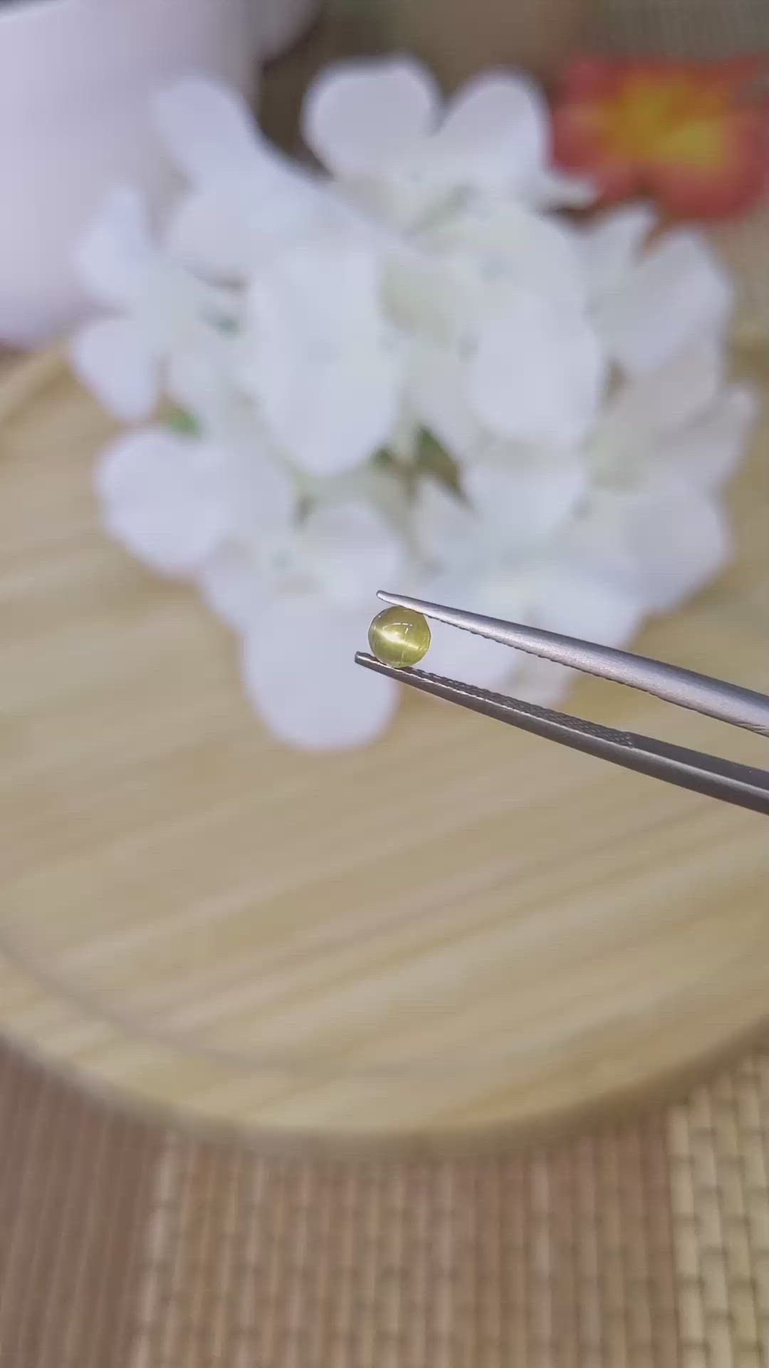 0.65 Ct. Greenish Yellow Cabochon Chrysoberyl from Ceylon (Sri Lanka) Size Video