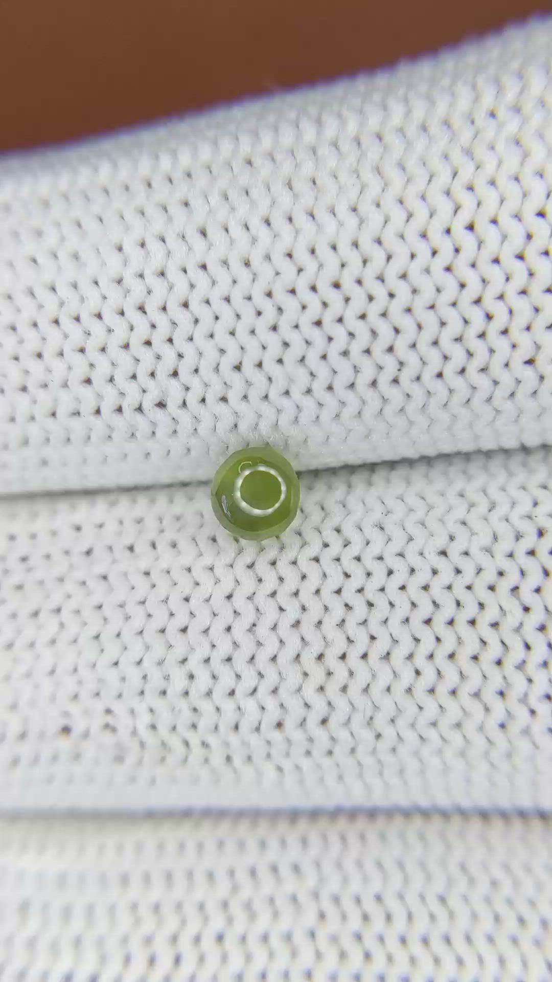 0.65 Ct. Greenish Yellow Cabochon Chrysoberyl from Ceylon (Sri Lanka) Size Video