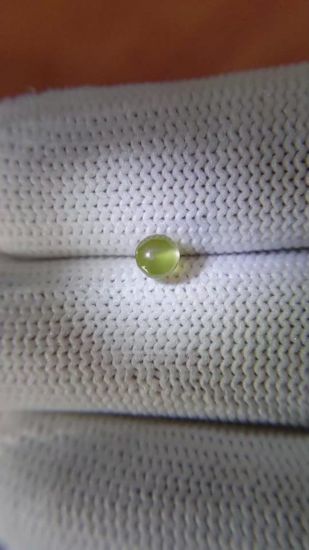 0.65 Ct. Greenish Yellow Cabochon Chrysoberyl from Ceylon (Sri Lanka) Size Video