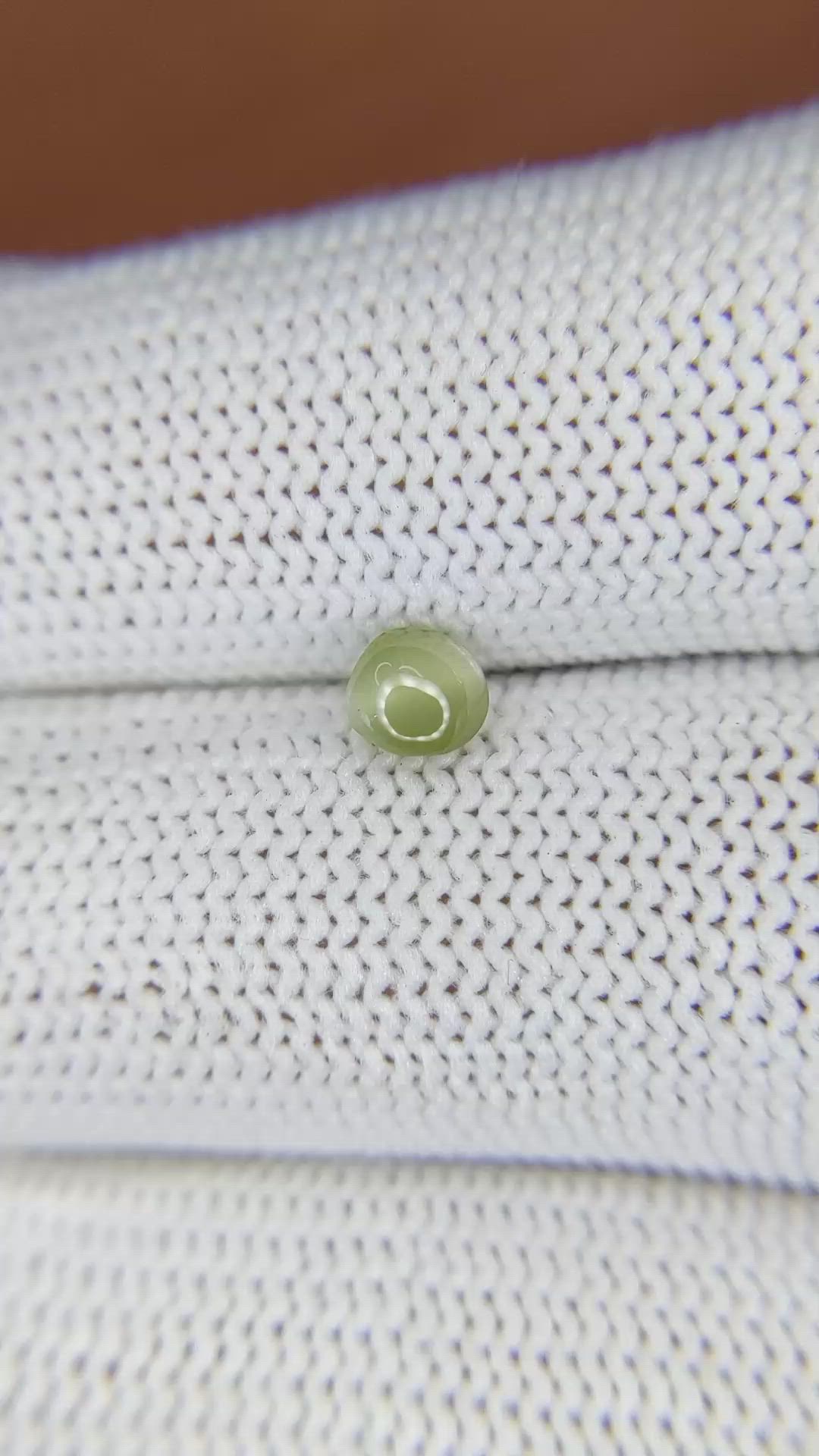 0.70 Ct. Yellowish Green Cabochon Chrysoberyl from Ceylon (Sri Lanka) Size Video
