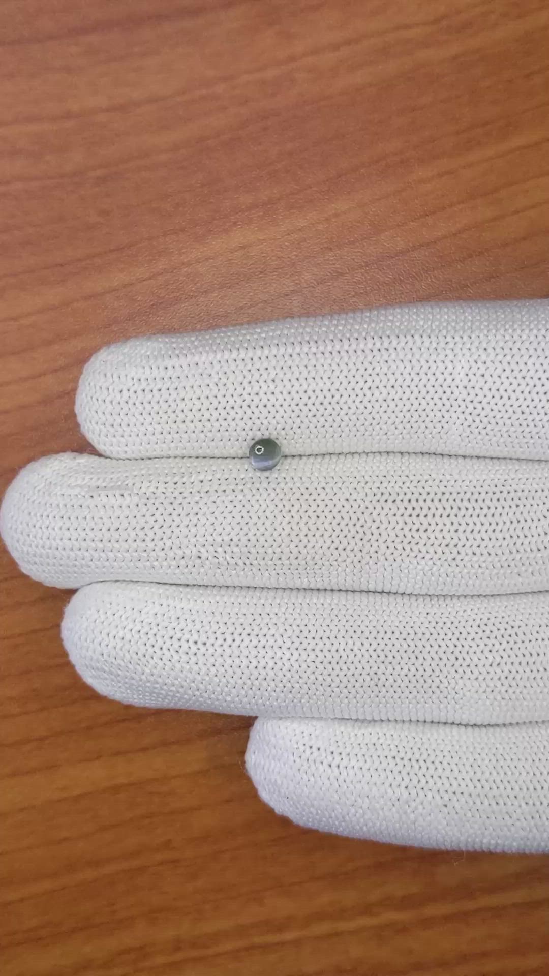 0.37 Ct. Green Cabochon Chrysoberyl from Ceylon (Sri Lanka) Size Video