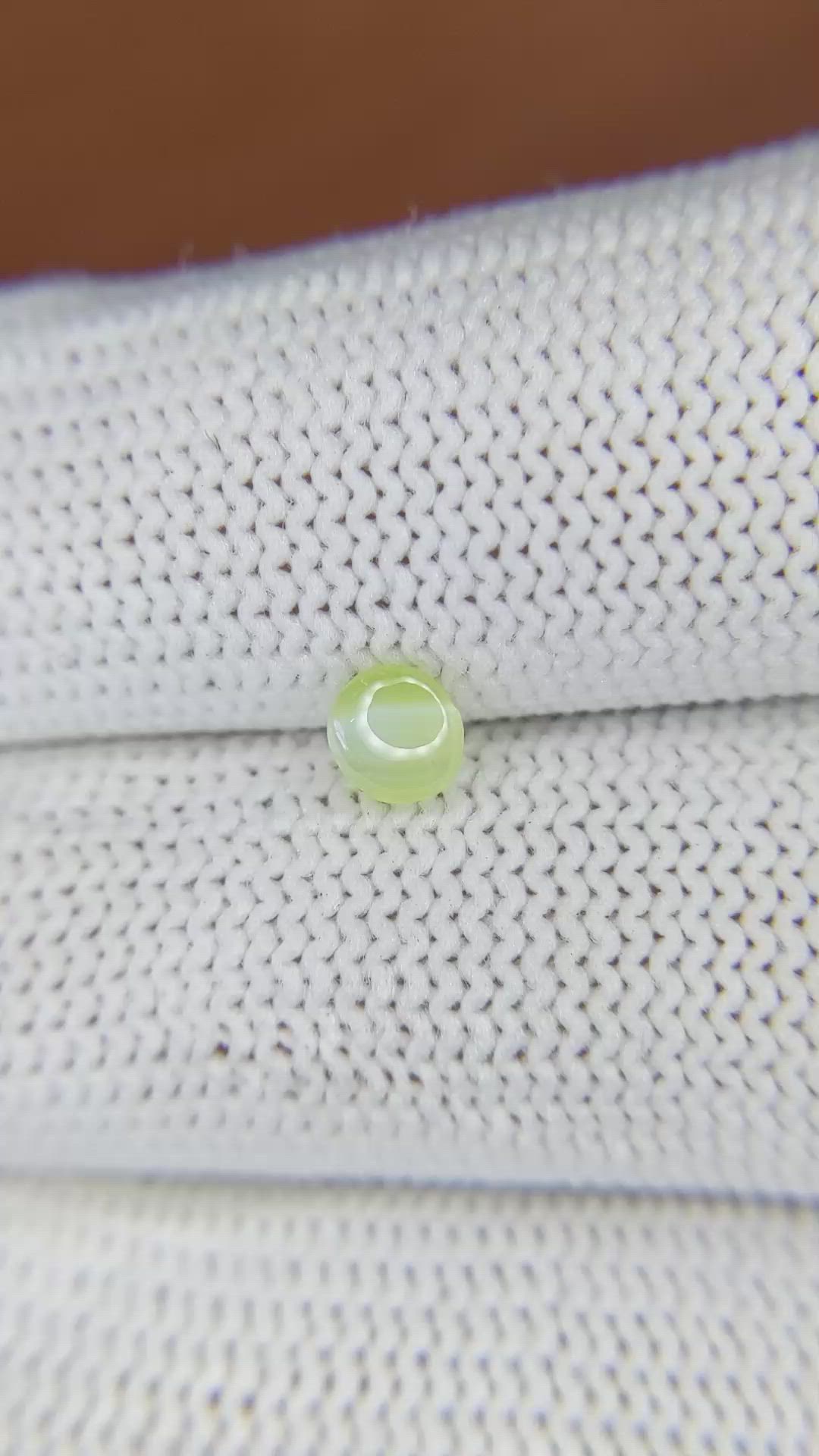 0.55 Ct. Greenish Yellow Cabochon Chrysoberyl from Ceylon (Sri Lanka) Size Video
