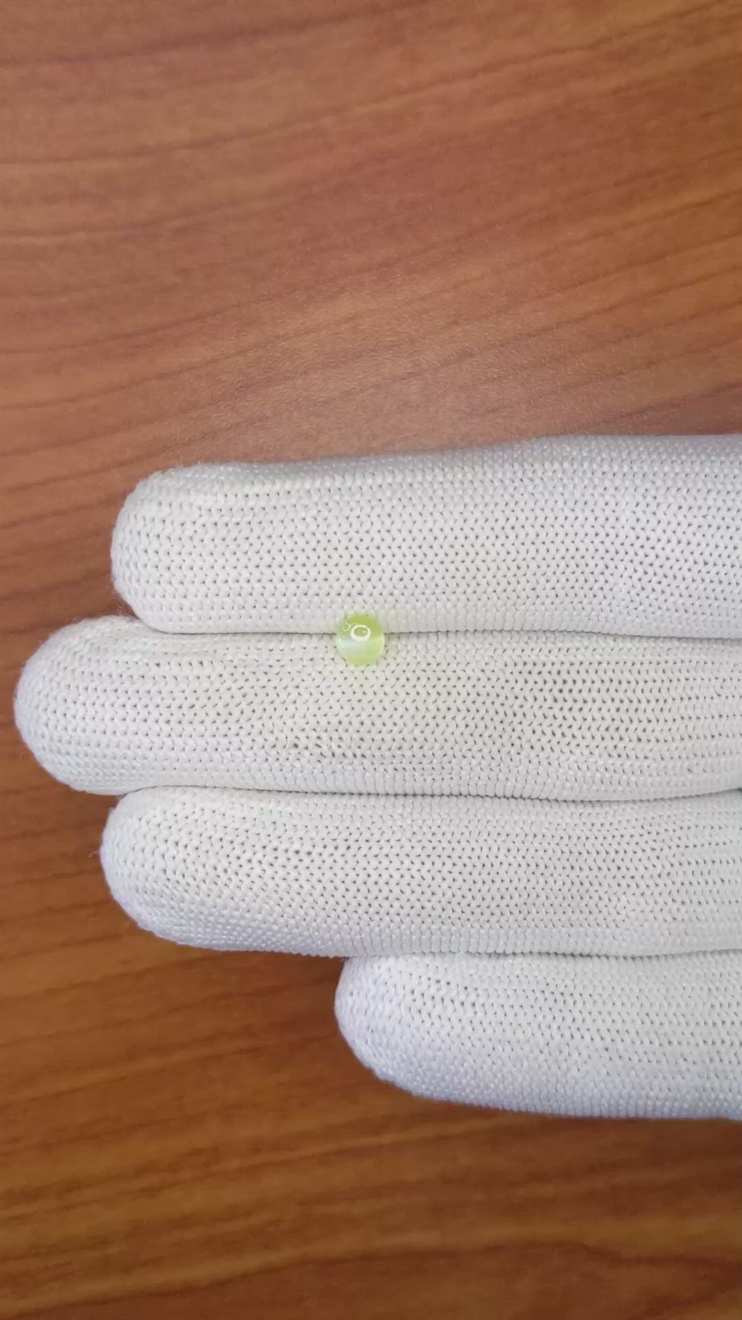 0.55 Ct. Greenish Yellow Cabochon Chrysoberyl from Ceylon (Sri Lanka) Size Video