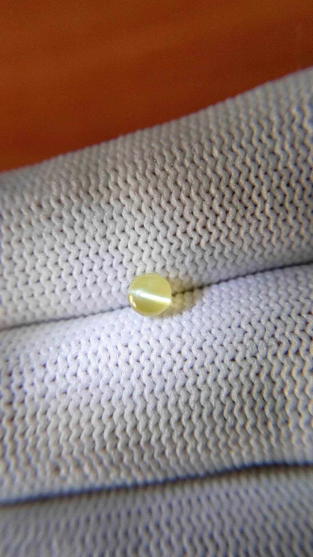 0.64 Ct. Yellow Cabochon Chrysoberyl from Ceylon (Sri Lanka) Size Video