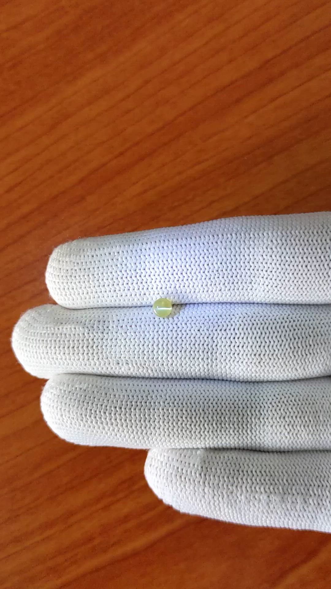 0.64 Ct. Yellow Cabochon Chrysoberyl from Ceylon (Sri Lanka) Size Video