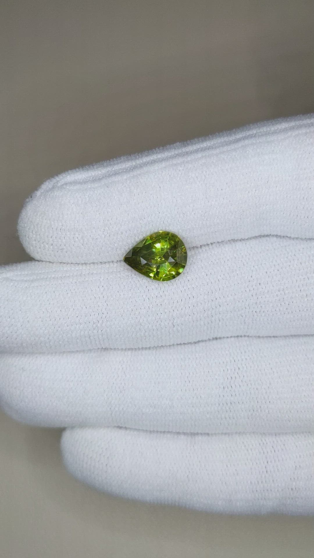 2.29 Ct. Yellowish Green Sphene (Titanite) from Madagascar Size Video