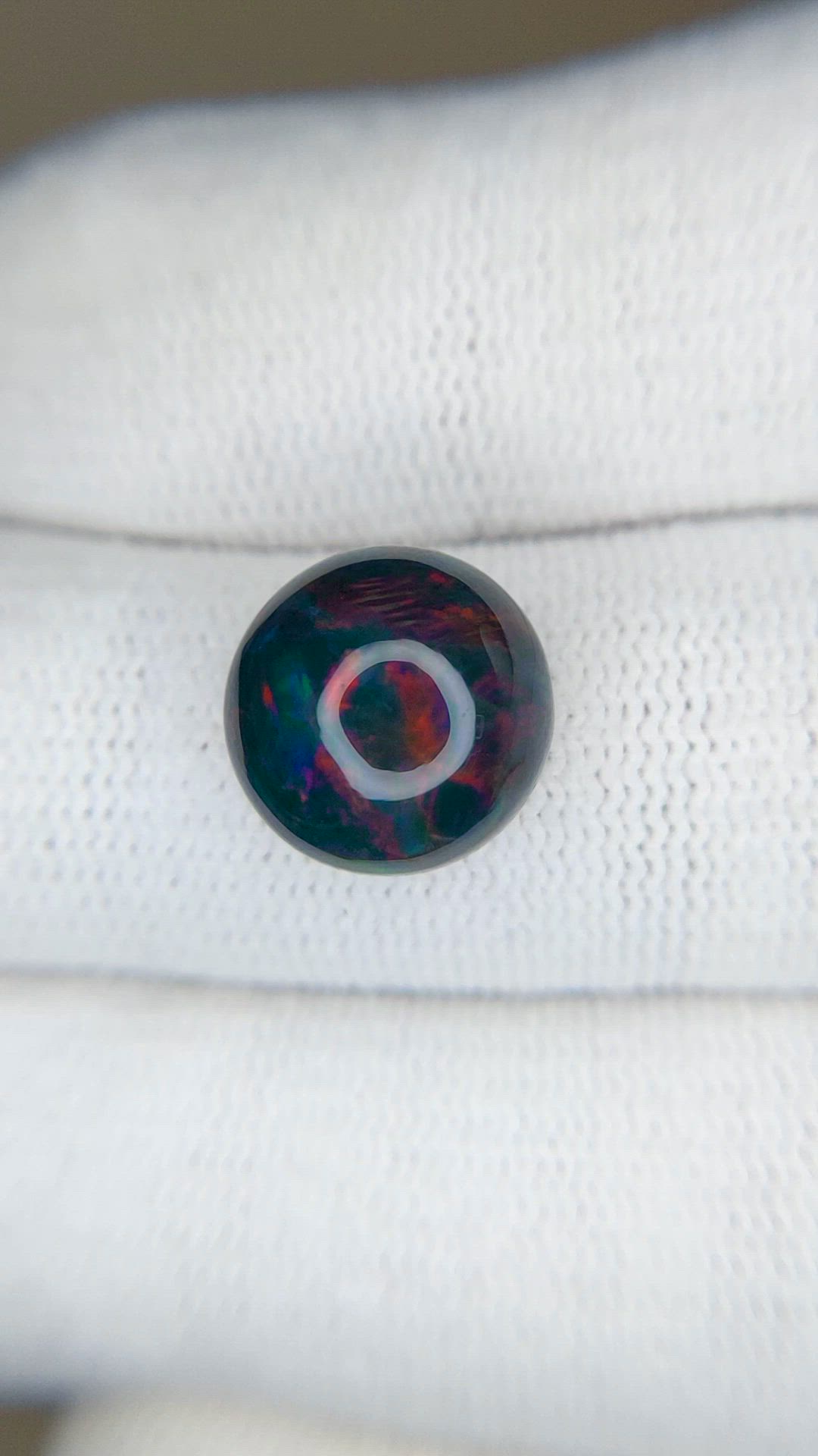 3.92 Ct. Multi Color Cabochon Black Opal from Ethiopia Size Video