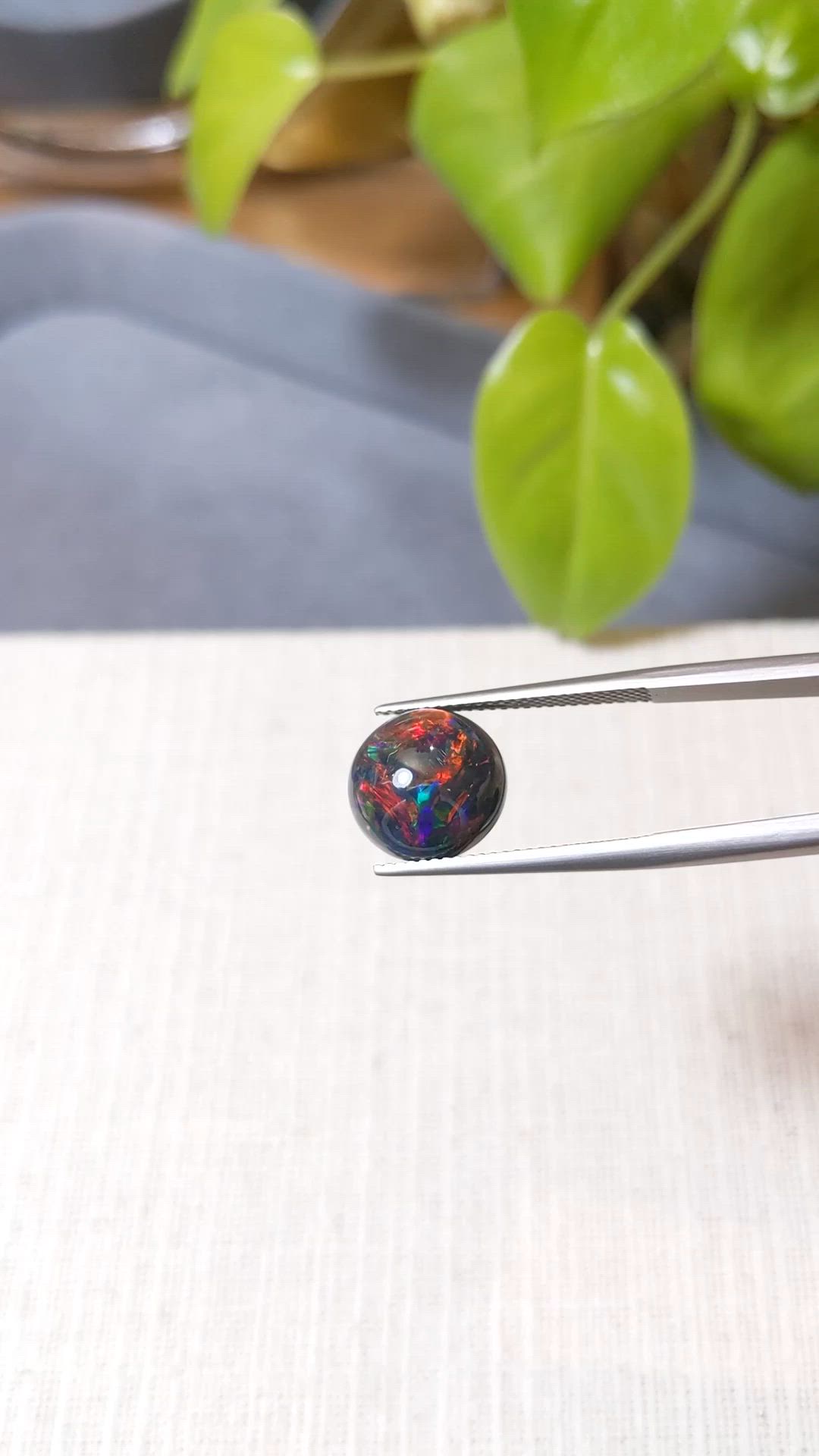 3.92 Ct. Multi Color Cabochon Black Opal from Ethiopia Size Video