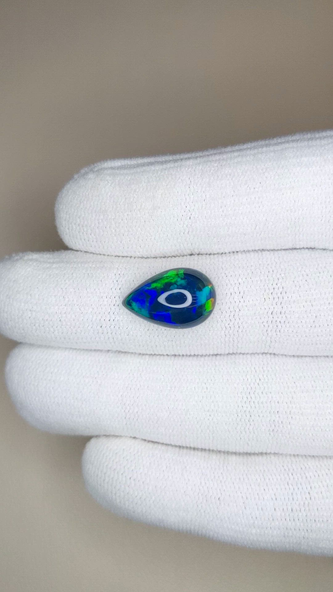 4.15 Ct. Multi Color Cabochon Black Opal from Ethiopia Size Video