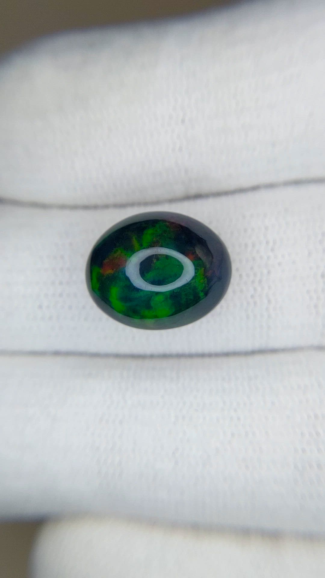 4.95 Ct. Multi Color Cabochon Black Opal from Ethiopia Size Video