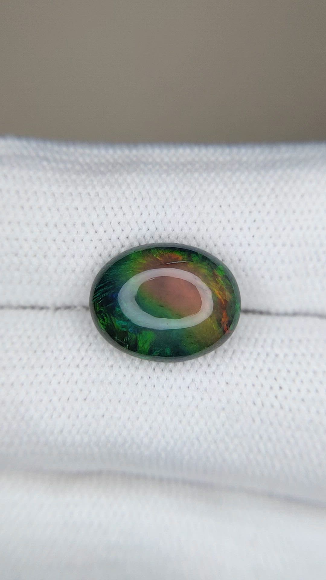 3.44 Ct. Multi Color Cabochon Black Opal from Ethiopia Size Video