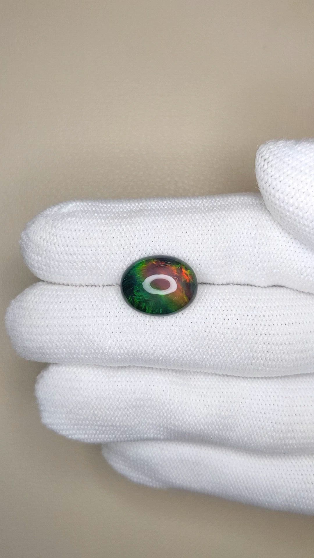 3.44 Ct. Multi Color Cabochon Black Opal from Ethiopia Size Video