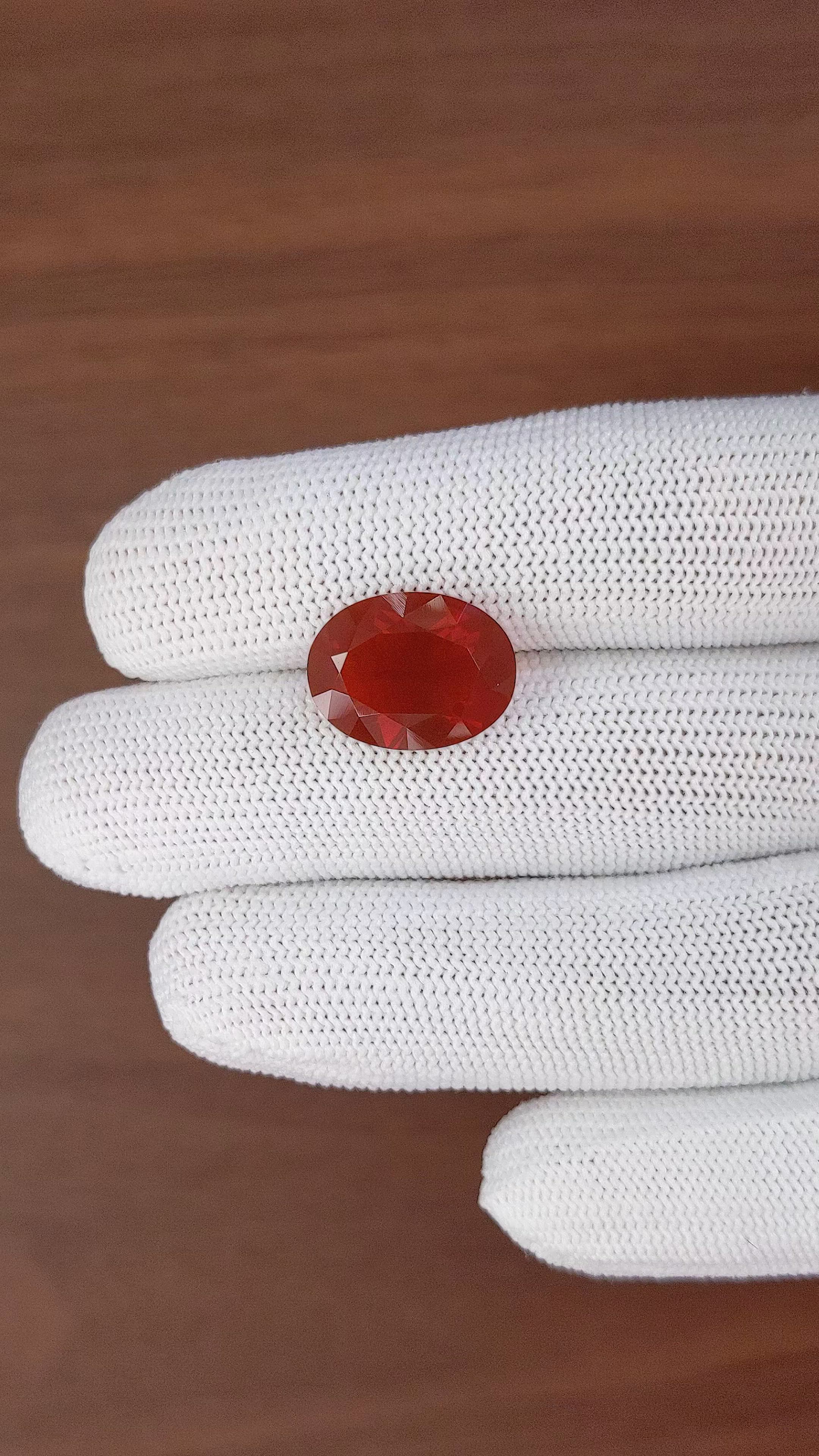 5.82 Ct. Red Fire Opal from Mexico Size Video