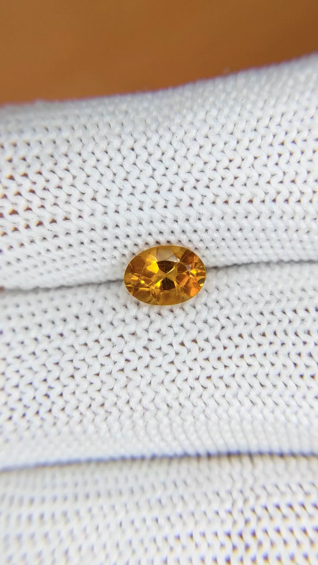 0.70 Ct. Orangish Yellow Madeira Citrine from Brazil Size Video