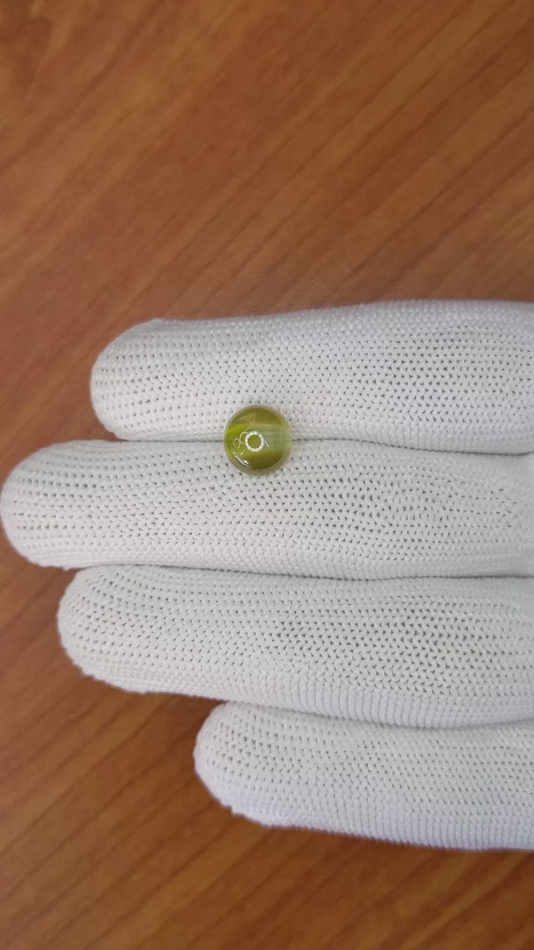 4.33 Ct. Brownish Yellow Cabochon Chrysoberyl from Ceylon (Sri Lanka) Size Video