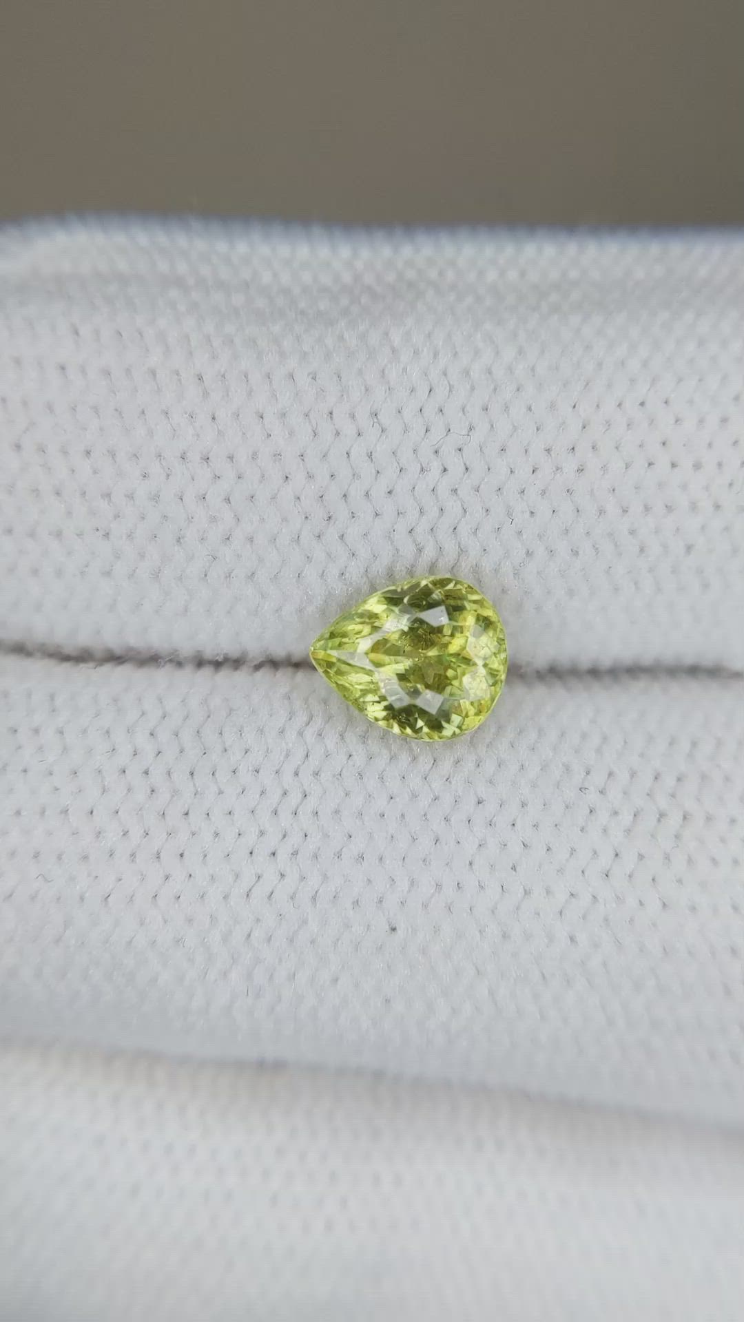 1.09 Ct. Yellowish Green Sphene (Titanite) from Madagascar Size Video