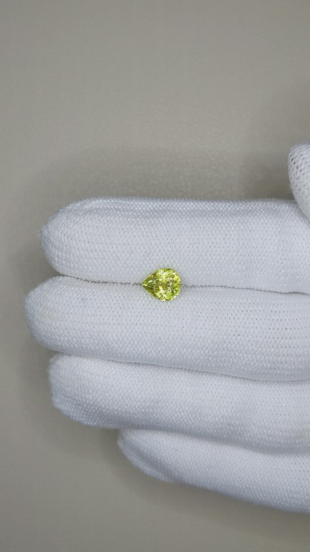 1.09 Ct. Yellowish Green Sphene (Titanite) from Madagascar Size Video