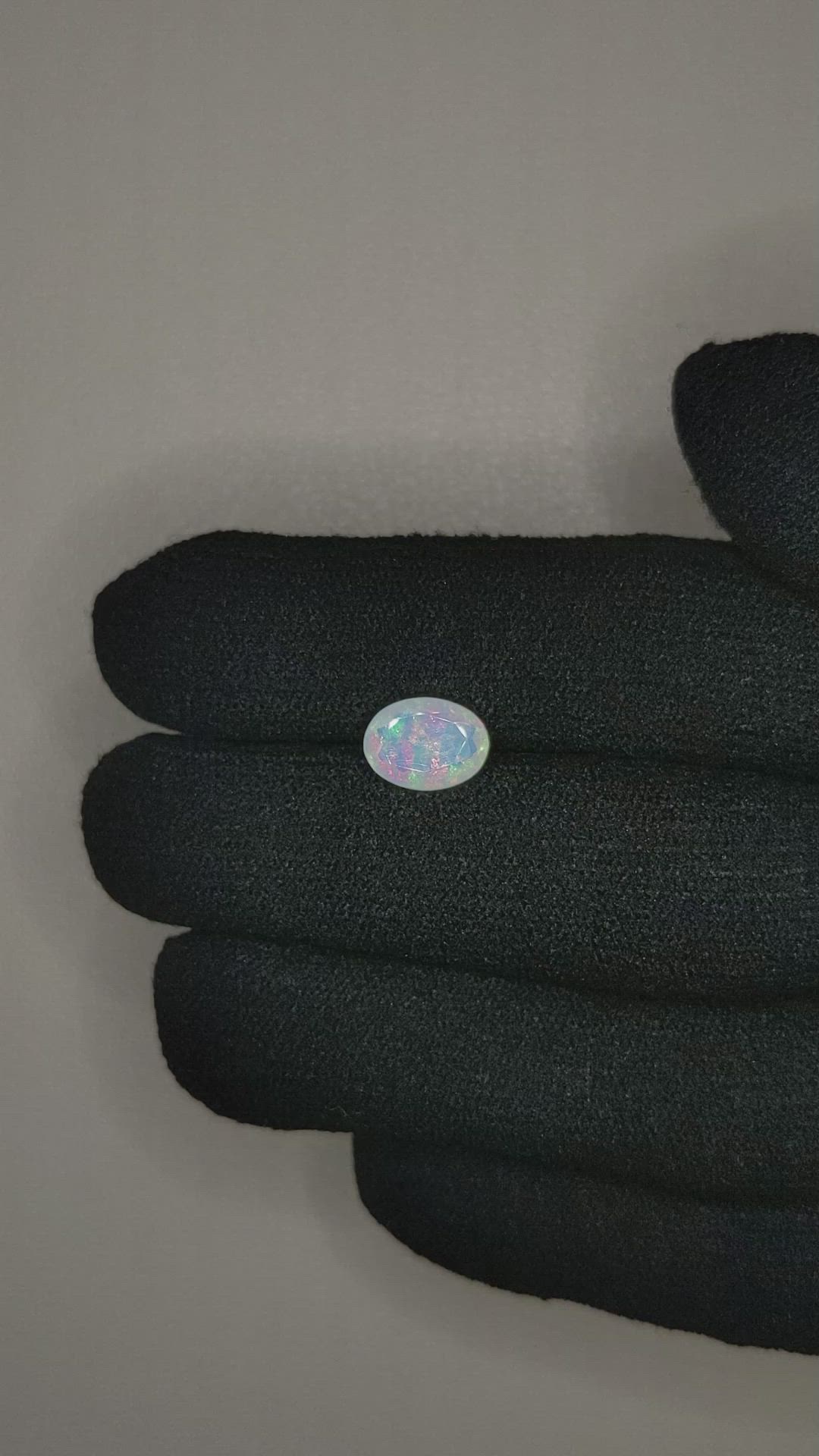 0.85 Ct. Multi Color White Opal from Ethiopia Size Video