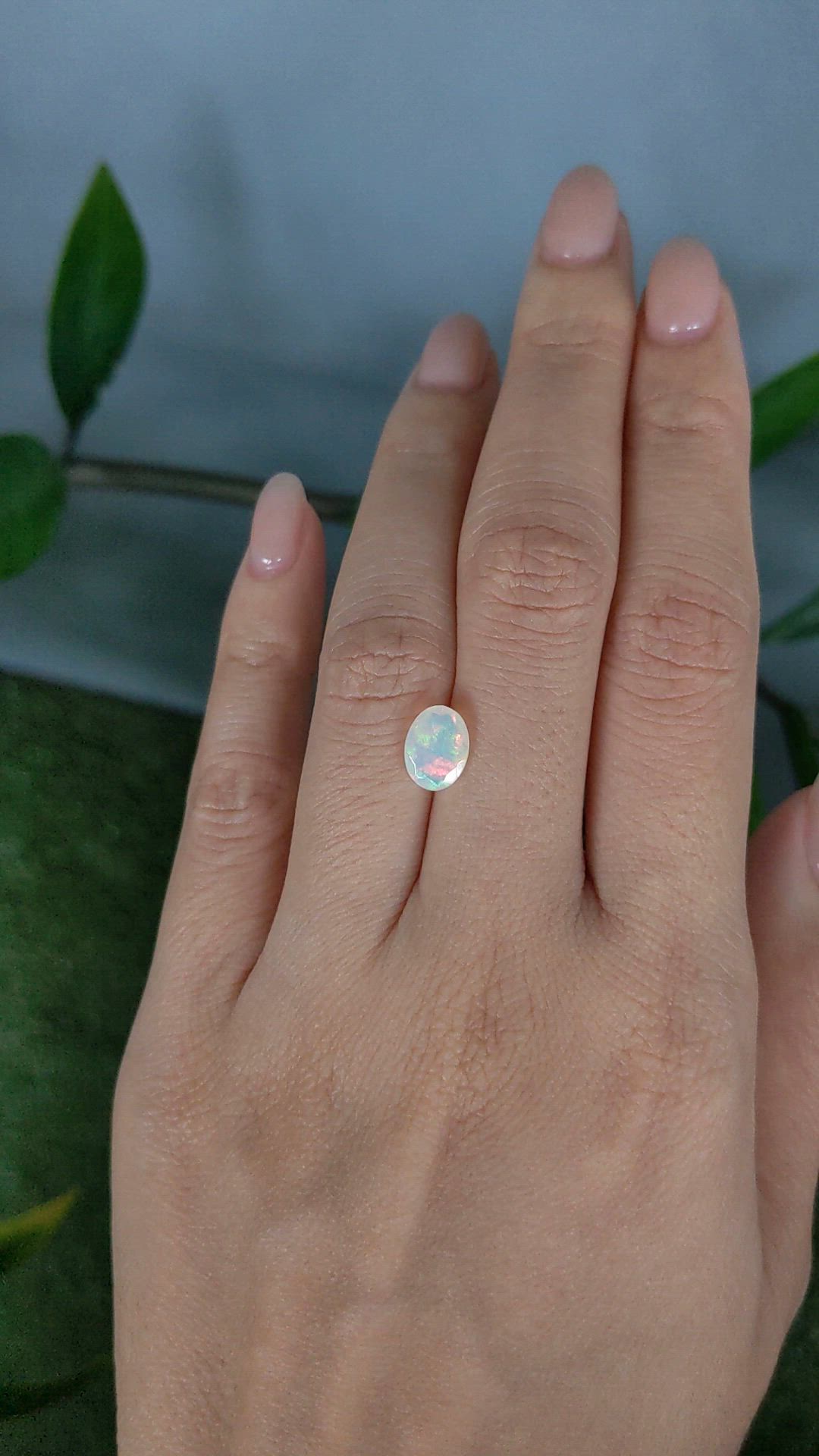 0.85 Ct. Multi Color White Opal from Ethiopia Size Video